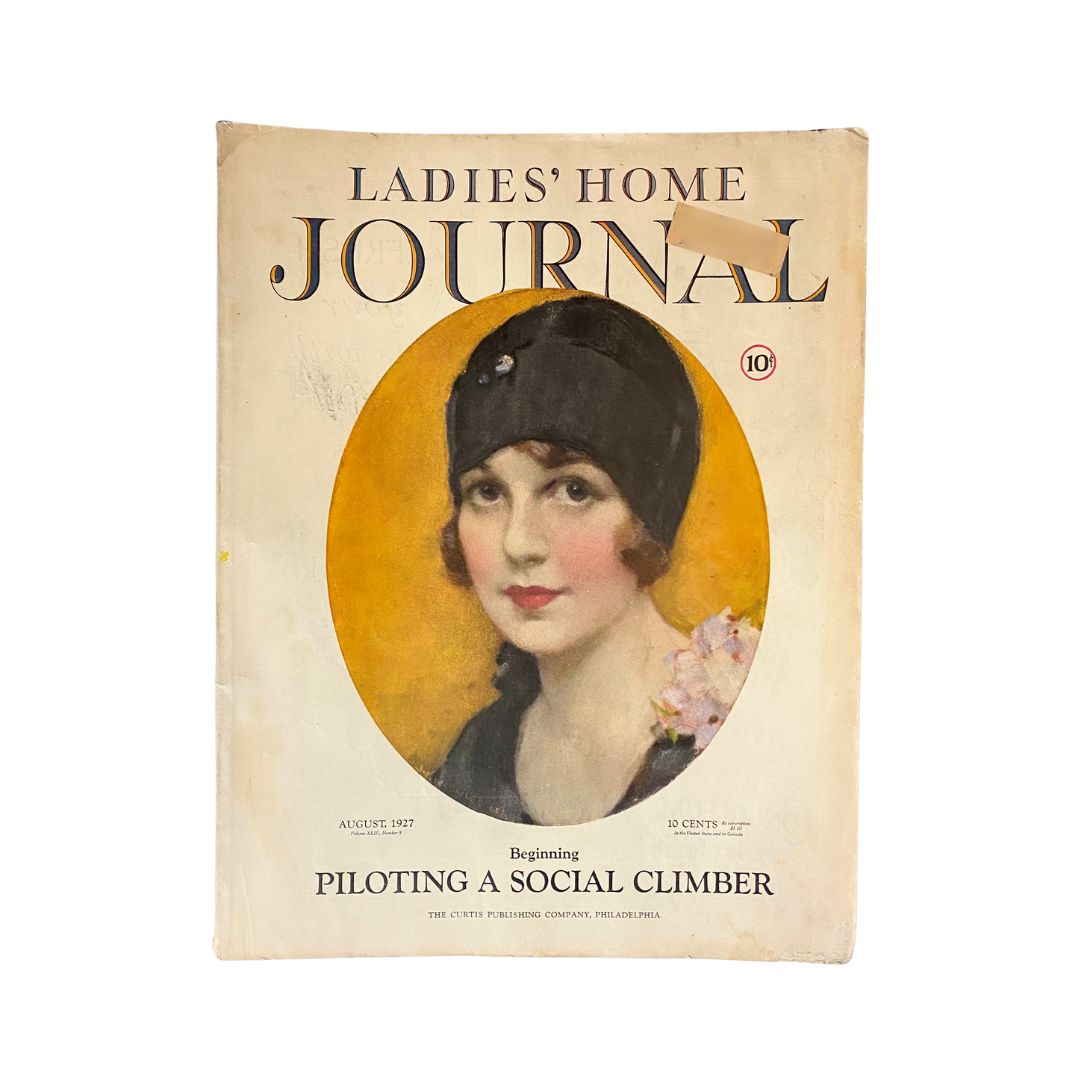 Cover of Ladies' Home Journal Magazine, August 1927, featuring the title 'Piloting A Social Climber' with a vintage portrait of a woman.