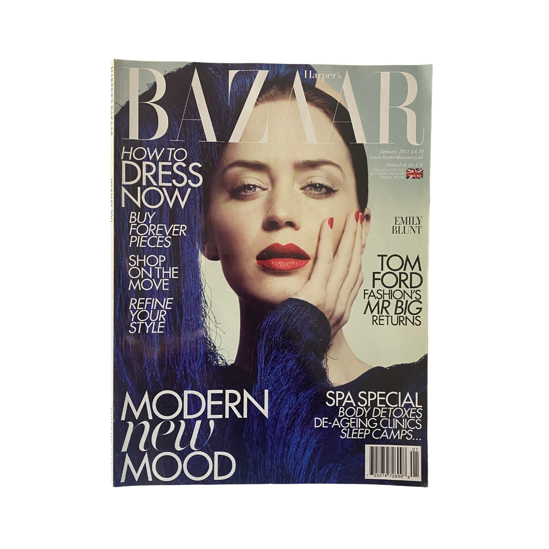 Harper's Bazaar UK January 2011 Magazine cover featuring Emily Blunt with striking blue hair and bold red lipstick, showcasing fashion trends and celebrity culture.