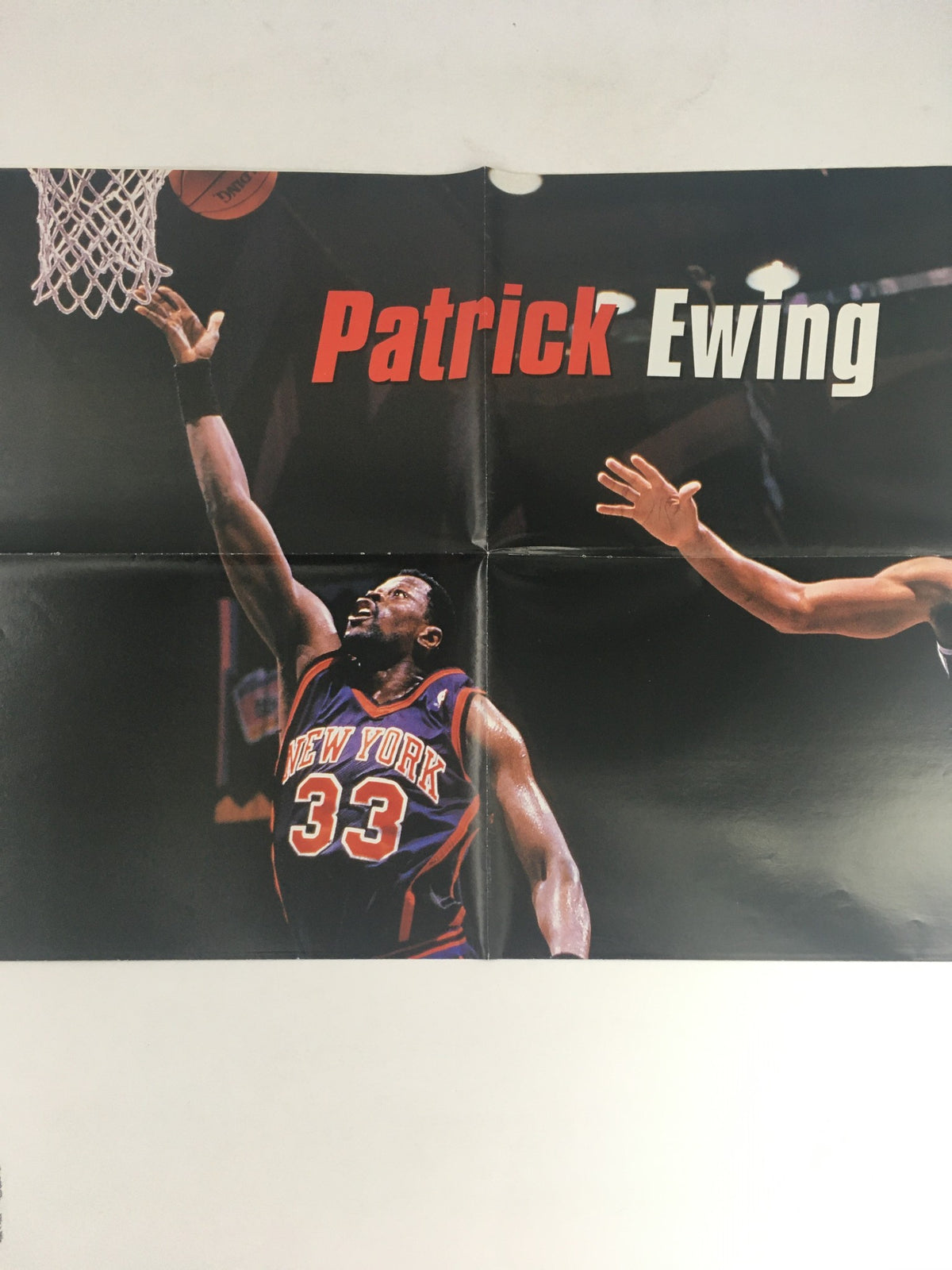 XXL Basketball Magazine April 1998 featuring Patrick Ewing in action, showcasing his iconic New York Knicks jersey, with a dynamic basketball play image.
