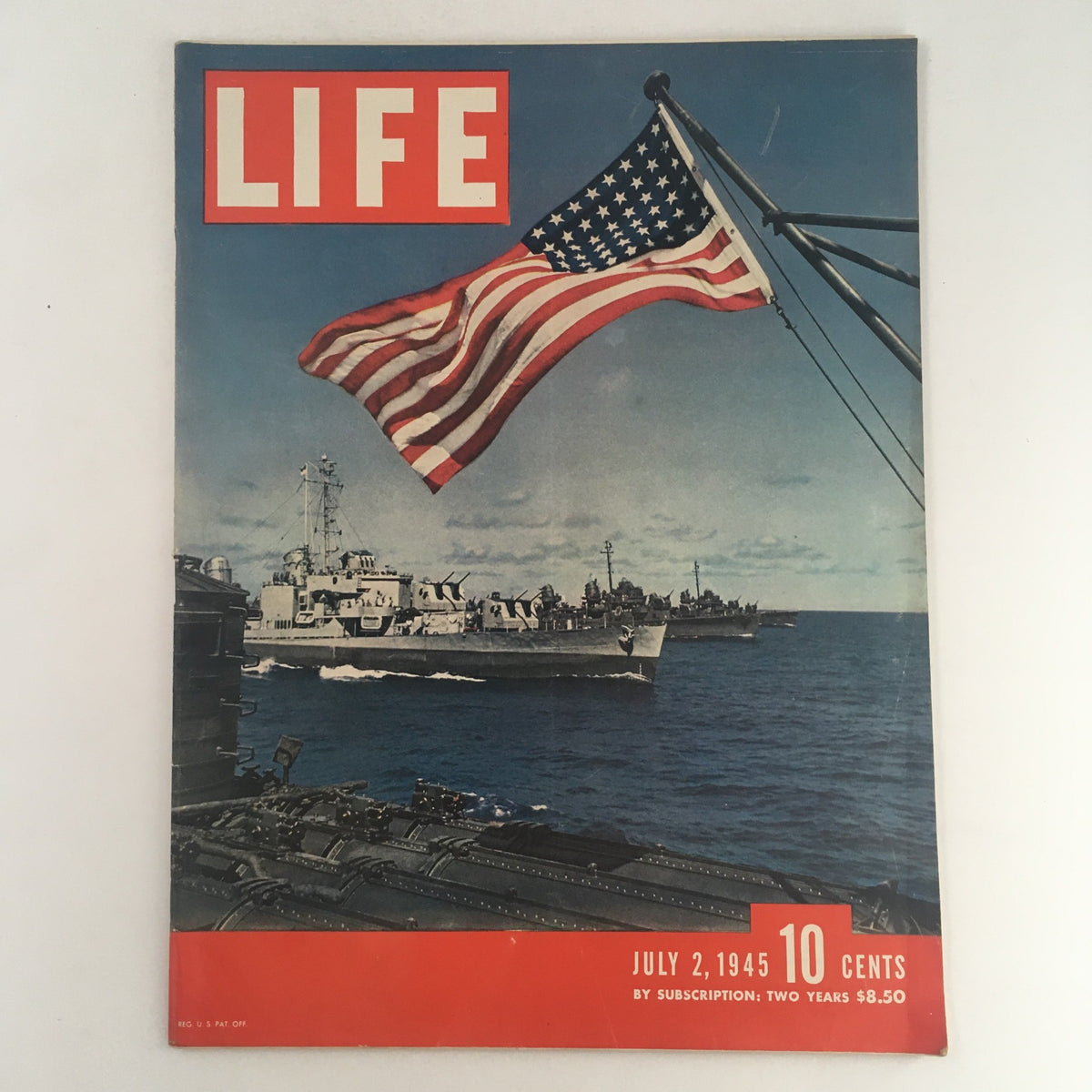 Life Magazine July 2, 1945 featuring an iconic cover with the American flag and Navy ships, highlighting Dwight Eisenhower's battleship during World War II.