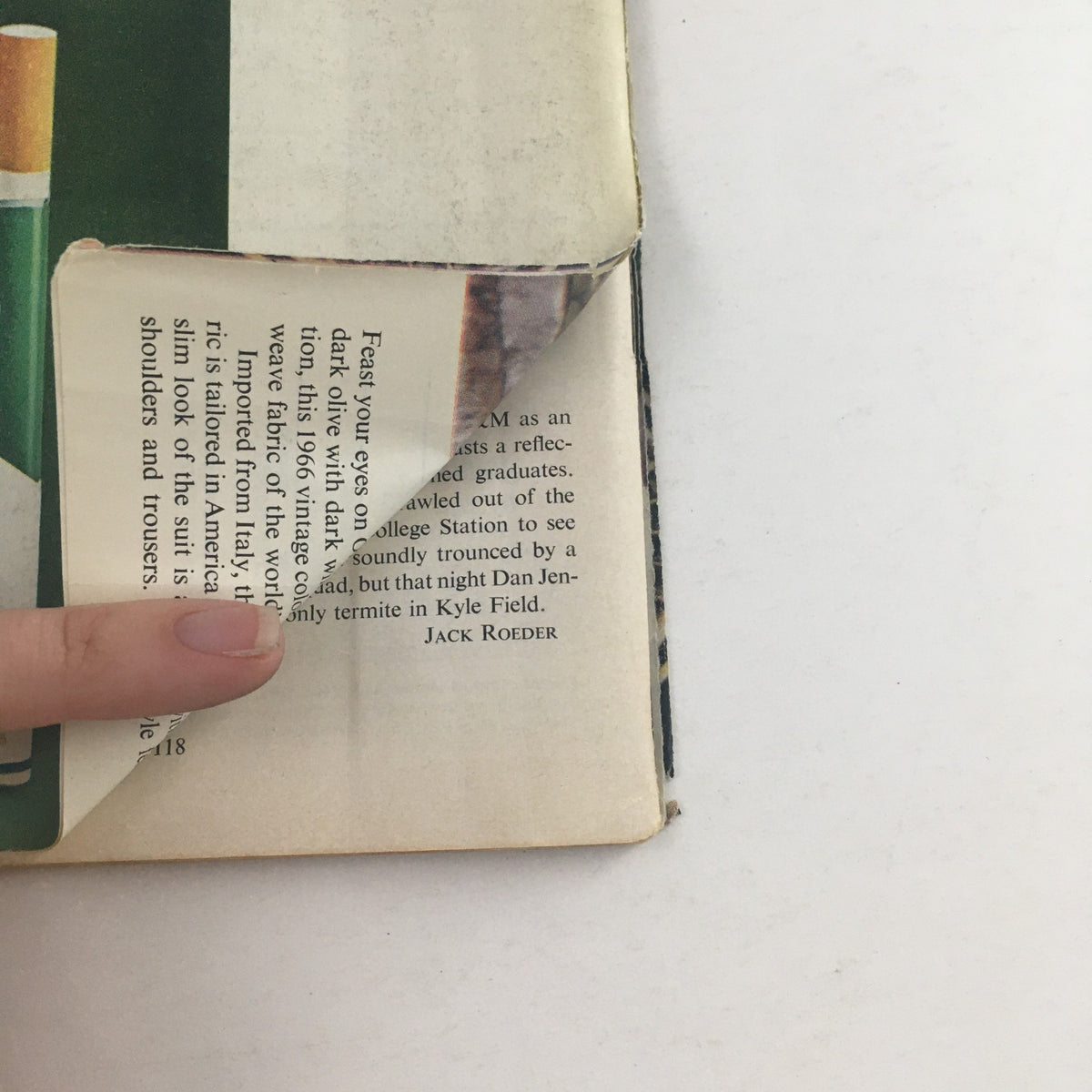 Close-up view of the back cover of Sports Illustrated Magazine December 5 1966 College Basketball The New Superstar, featuring a folded corner and text discussing aspects of college football, showcasing vintage magazine design.