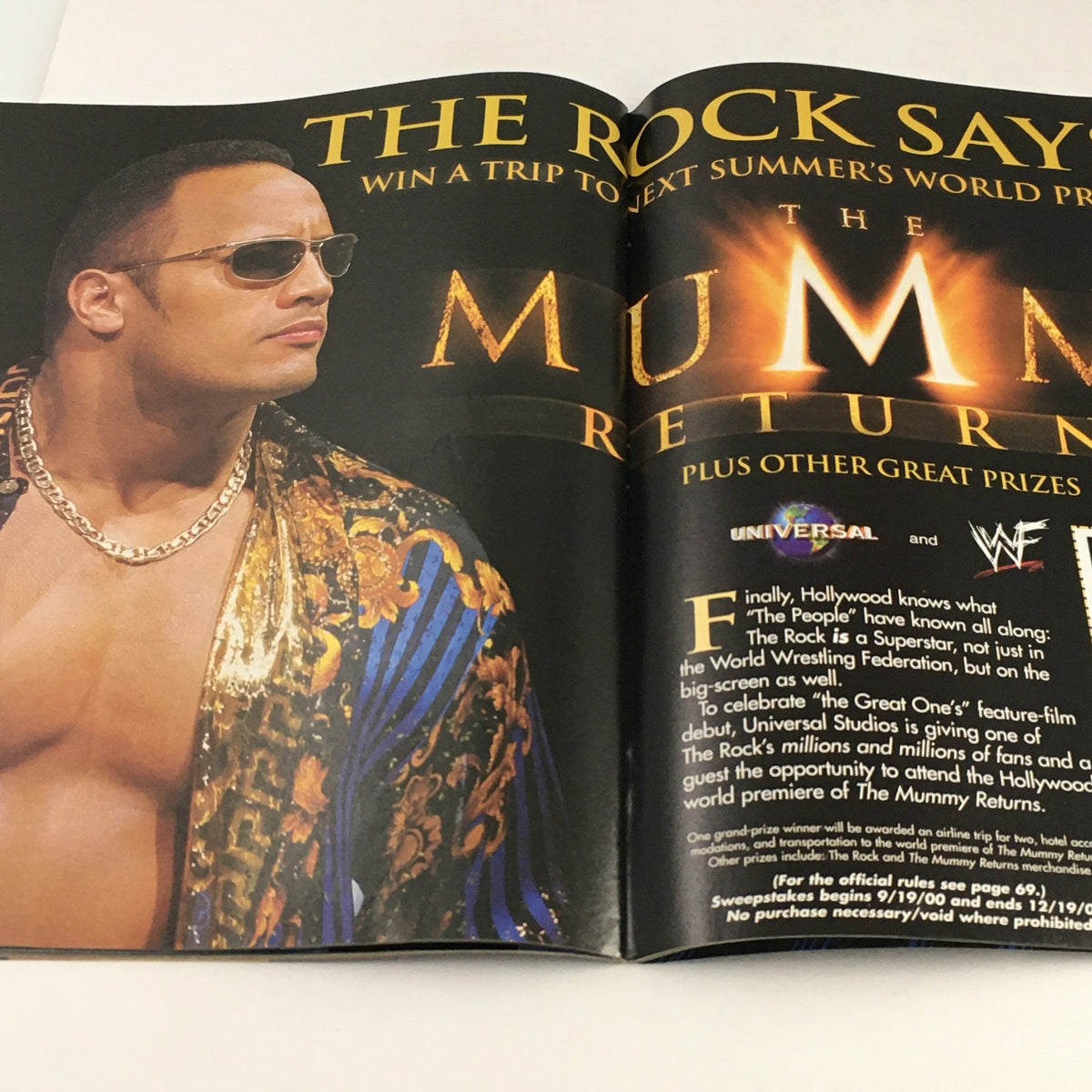 WWF Magazine December 2000 with an advertisement featuring Dwayne 'The Rock' Johnson promoting The Mummy Returns, highlighting his crossover into Hollywood.