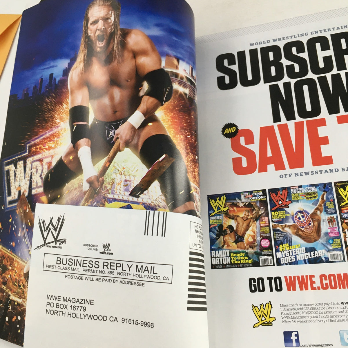 WWF Magazine 2011 Wrestle Mania XXVII advertisement page with subscription information for WWE Magazine, emphasizing collector's value.