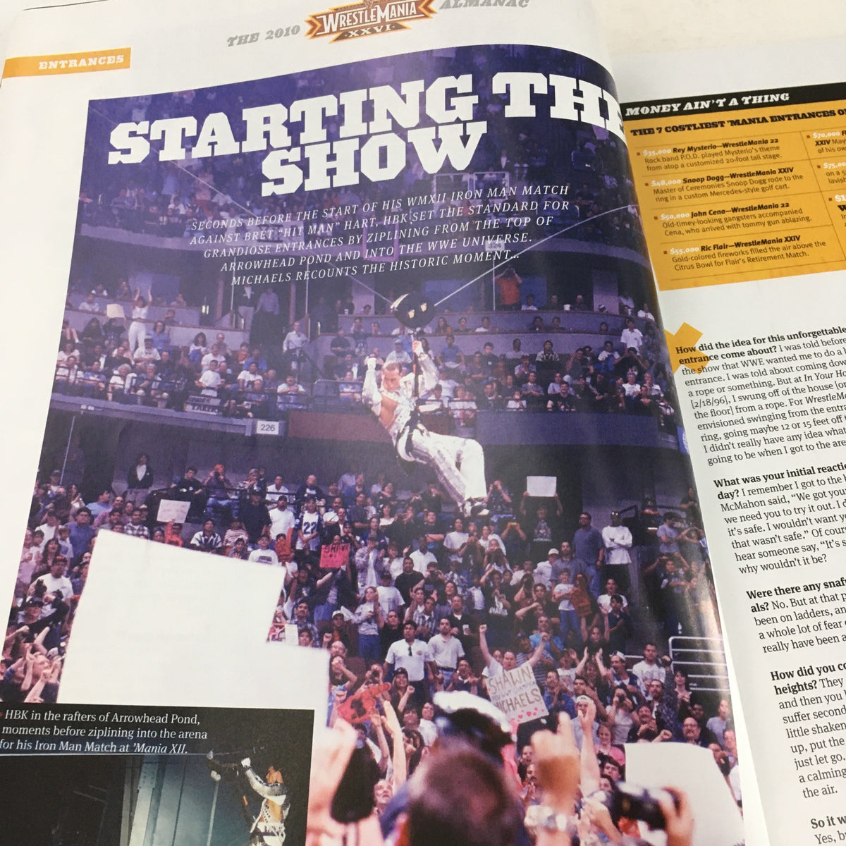 Page in WWF Magazine 2010 detailing the entrance of Shawn Michaels at Wrestle Mania, highlighting iconic moments from Wrestle Mania XXVI Almanac.