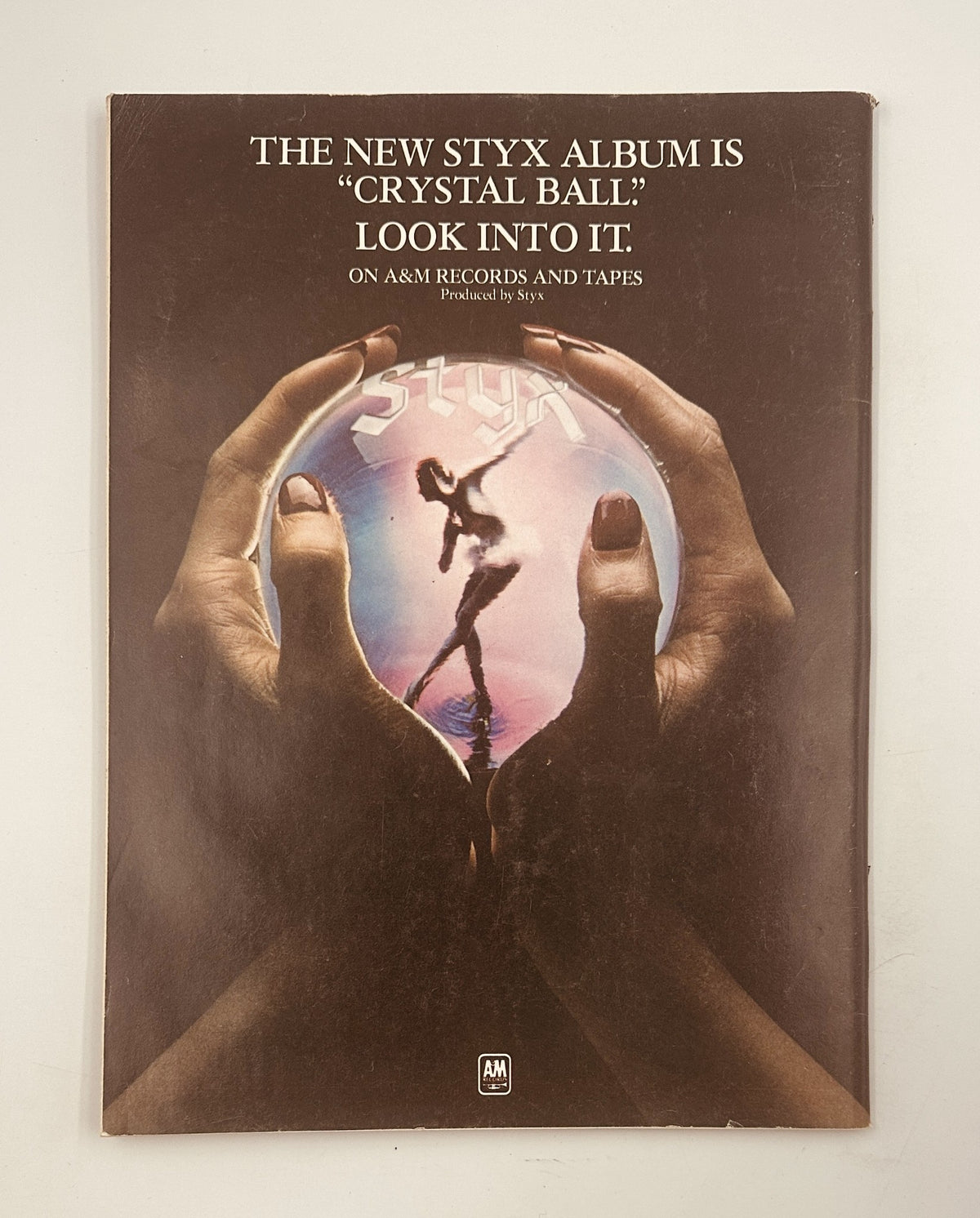 Back cover of High Times Magazine November 1976 promoting the Styx album 'Crystal Ball' with artistic imagery.