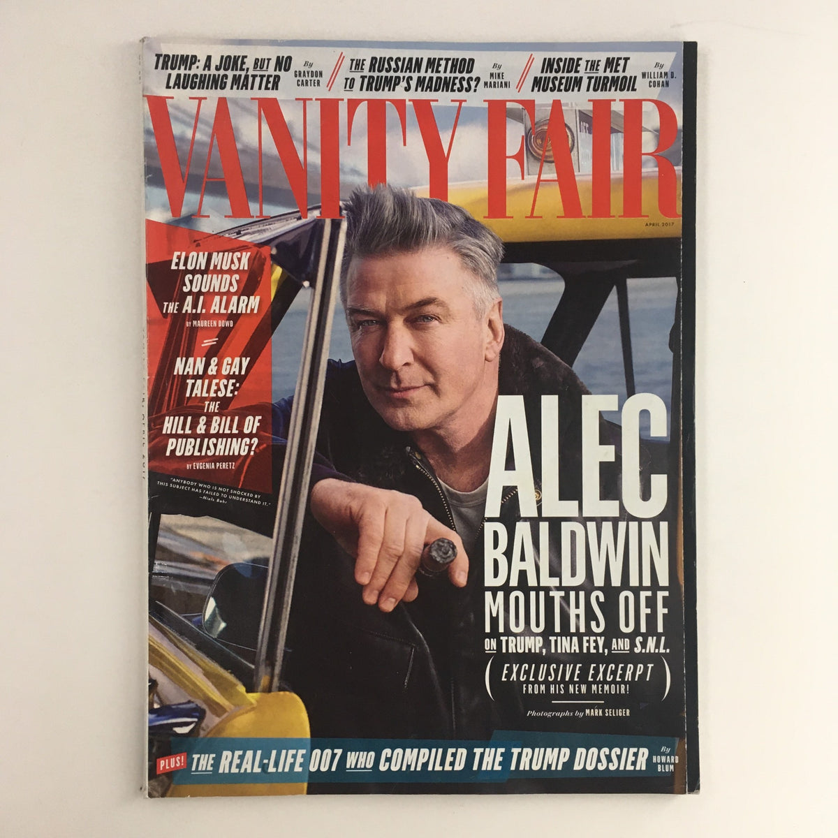 Vanity Fair Magazine April 2017 cover featuring Alec Baldwin, who is featured with the title 'Alec Baldwin Mouths Off'. The magazine also highlights Elon Musk and includes commentary on contemporary cultural events and personalities.
