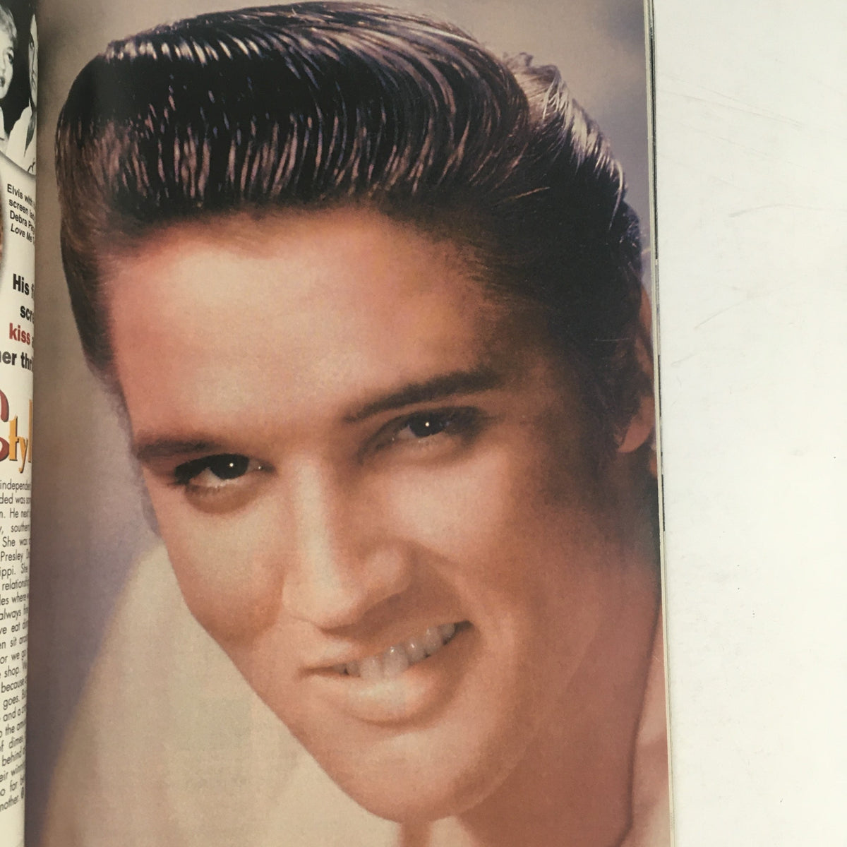 Inside page from Starlog Movie Series Presents 2000 Elvis Presley displaying a smiling avatar of Elvis Presley.