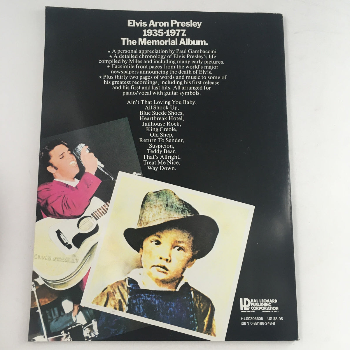Back cover of the Elvis Aron Presley 1935-1977 The Memorial Album, featuring a personal appreciation by Paul Gambaccini, a detailed chronology of Elvis’s life with early pictures, and highlights of his greatest recordings such as 'Ain't That Loving You Baby' and 'Jailhouse Rock'.
