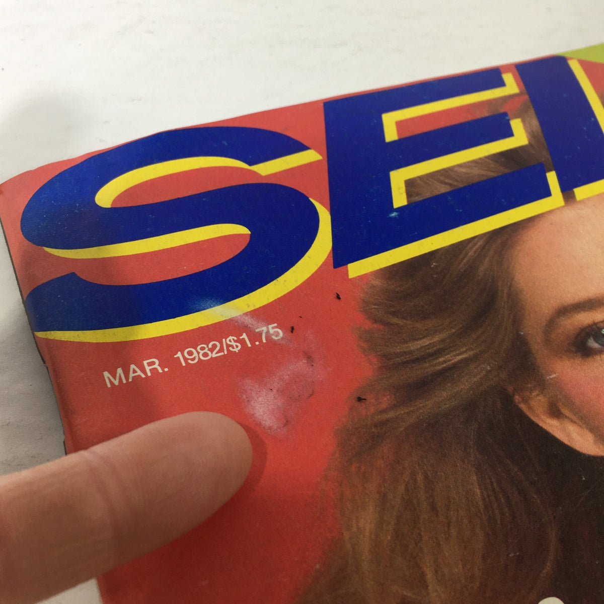Close-up view of the March 1982 Self Magazine cover featuring Kelly Emberg, highlighting the magazine title and pricing details. Perfect for vintage magazine collectors.
