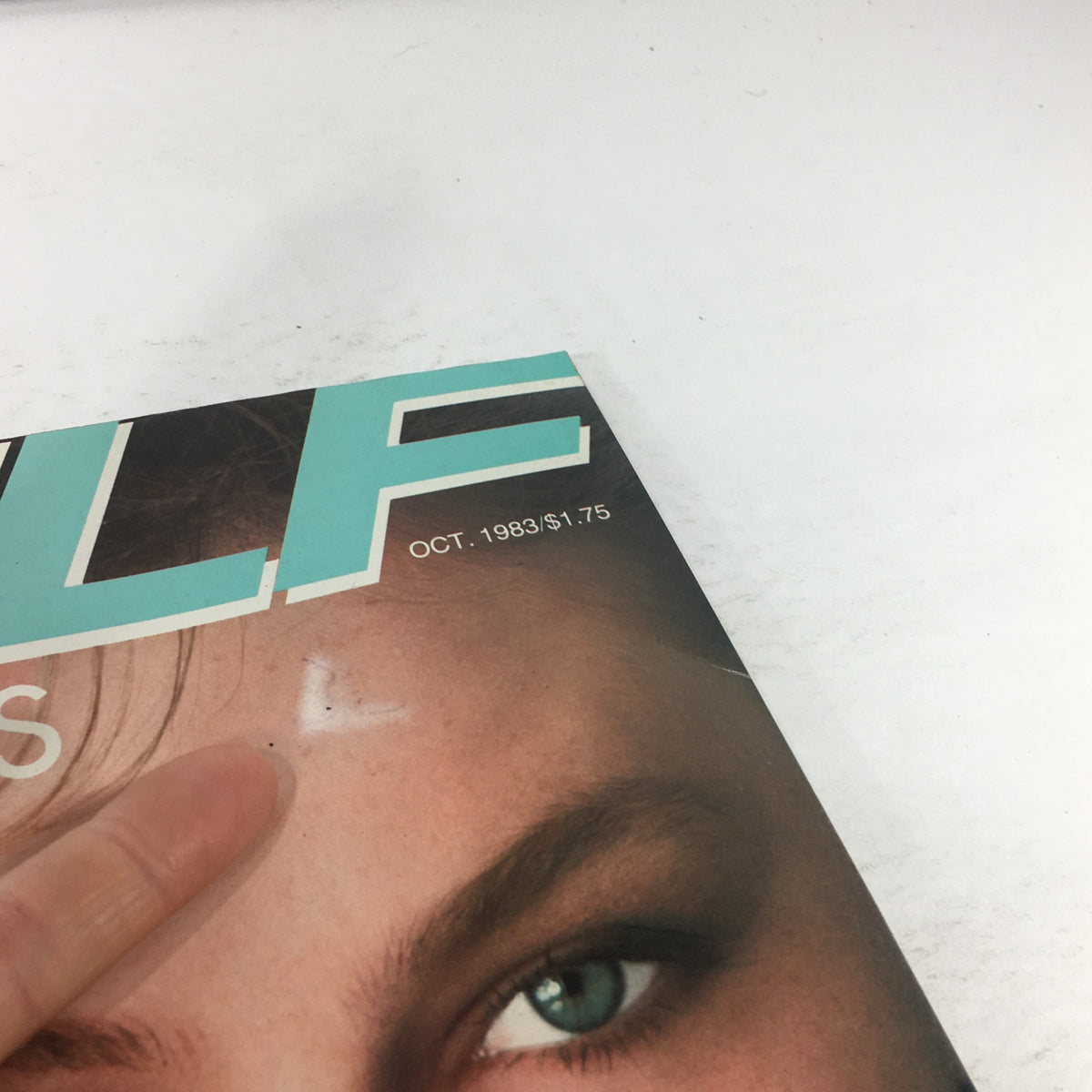 Close-up of the cover of VTG Self Magazine: October 1983 - The Walker's Shape-Up, showing detail of the magazine's title and minor imperfections typical of vintage items.