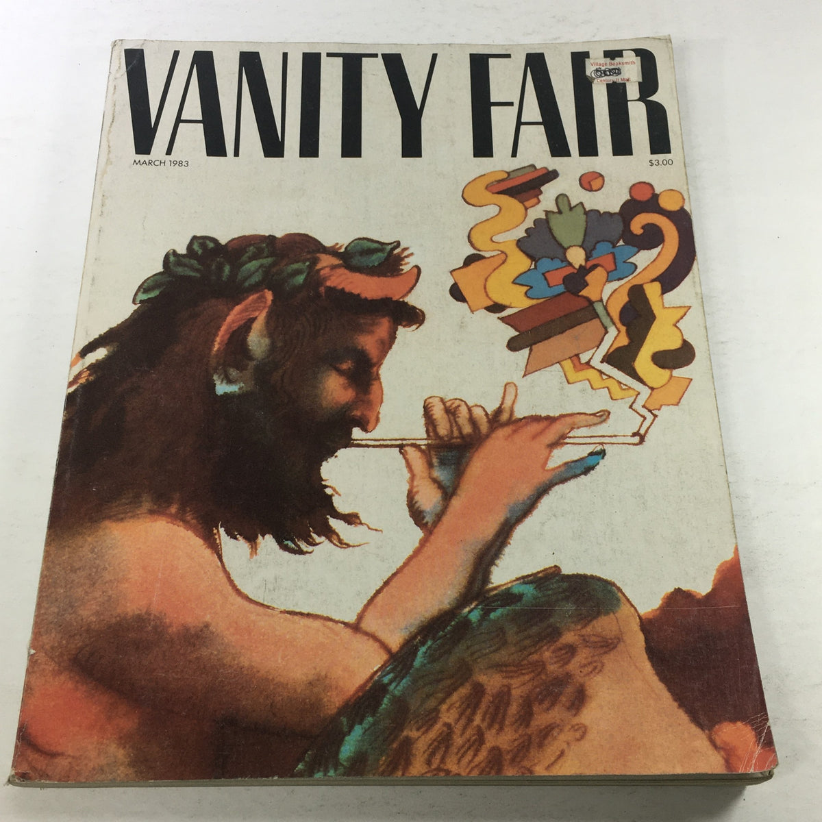 Cover of VTG Vanity Fair Magazine: March 1983 - First Issue After Relaunch, featuring a vibrant illustration of a mythological figure playing a pipe amidst colorful abstract designs.