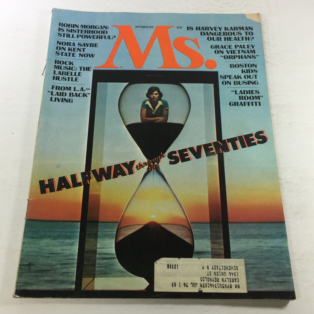 Vintage MS. Magazine from September 1975, featuring a woman inside an hourglass on the cover with the title 'Halfway Through The Seventies.' This collectible magazine highlights pivotal cultural issues of the 1970s.