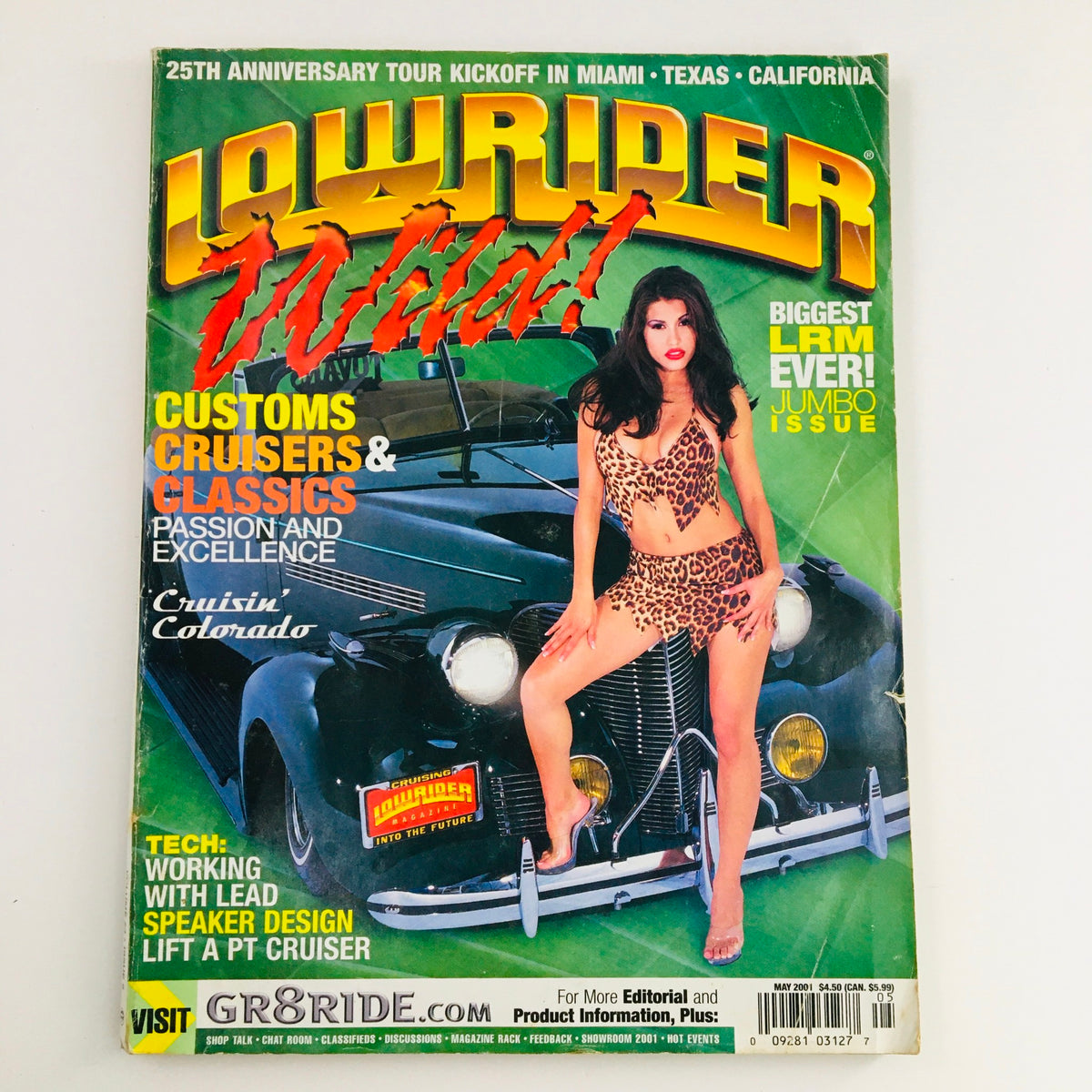 Cover of LowRider Magazine May 2001 featuring customs, cruisers, and classics with a model in a leopard print outfit. The magazine showcases the vibrant culture and automotive excellence of lowrider enthusiasts in a vintage context.