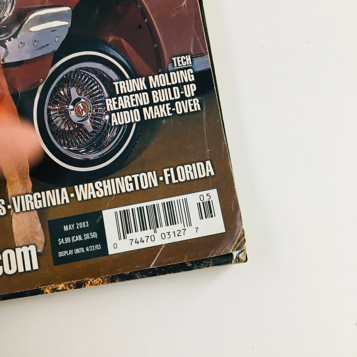Close-up of the barcode and pricing details on the bottom corner of the LowRider Magazine May 2003.