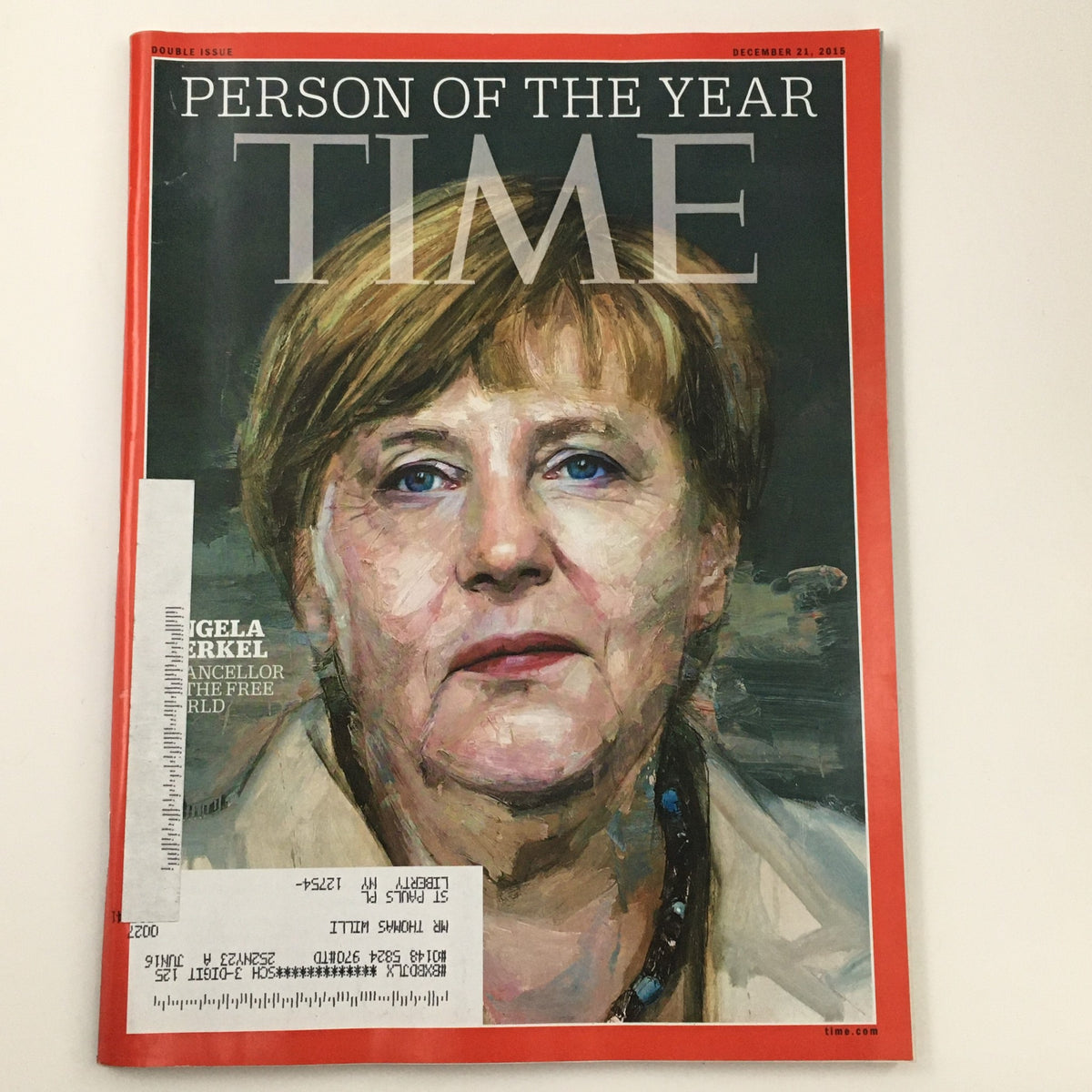 Time Magazine December 21 2015 cover featuring Angela Merkel as Person of the Year, depicting a portrait of the German Chancellor with a subtle expression, showcasing her leadership at a pivotal moment in global politics.