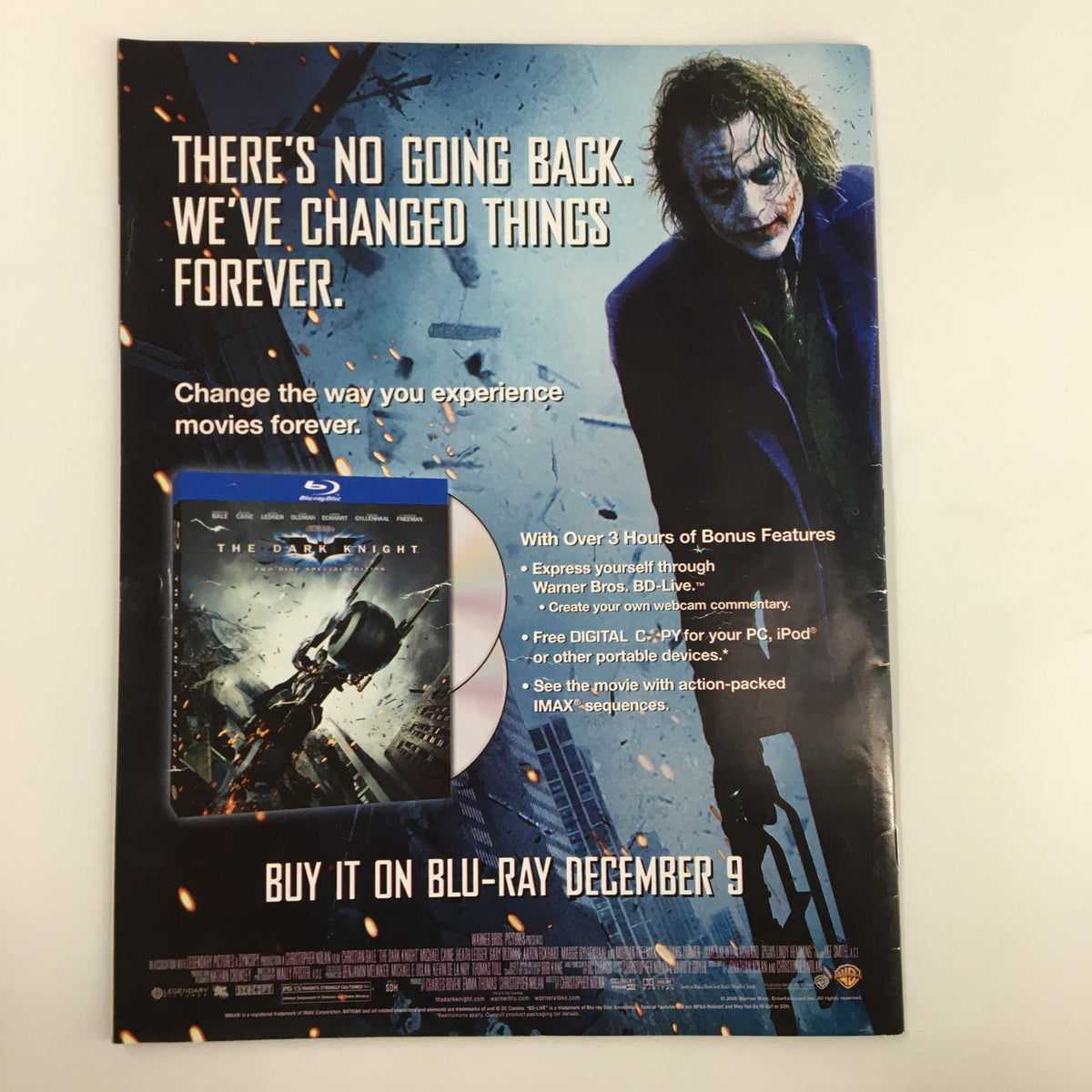 Advertisement on the back of Mad Magazine January 2009 No. 497 promoting the movie 'The Dark Knight' with The Joker, highlighting special Blu-ray features.