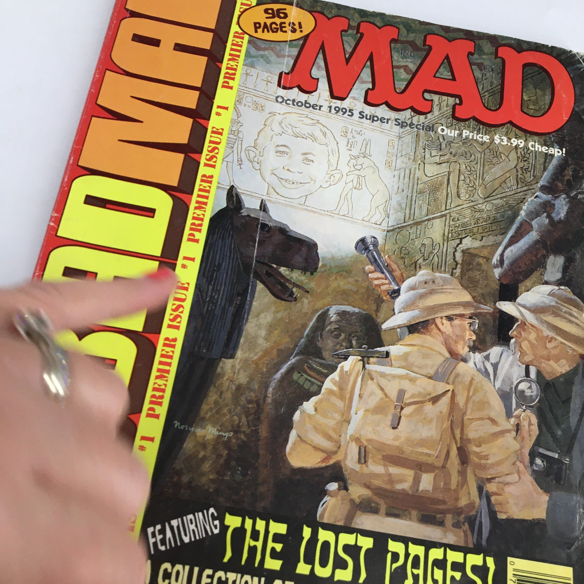 Close-up view of the cover of Mad Magazine October 1995, 'Big Bad Mad: The Lost Pages', highlighting the iconic art and amusing text.