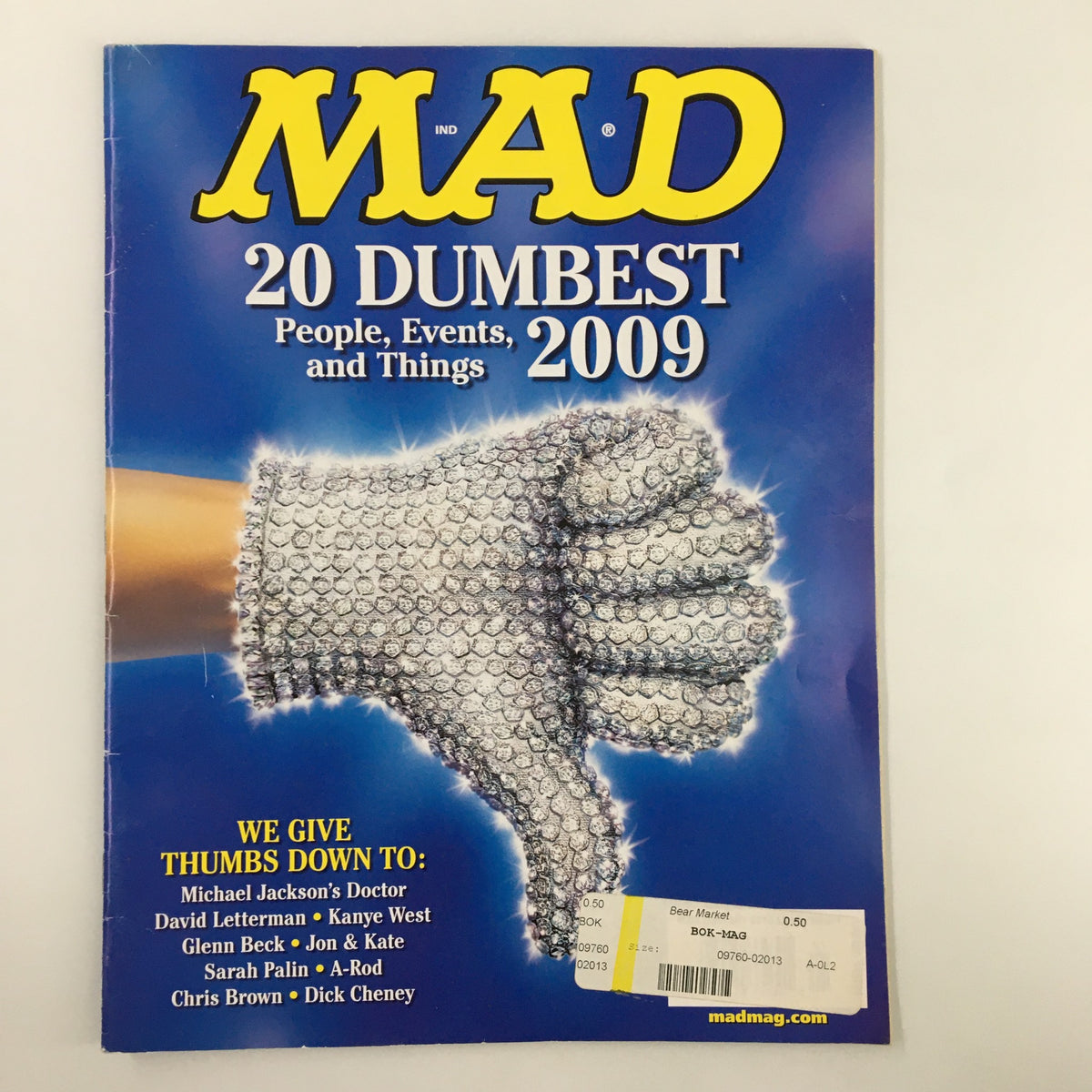 Cover of Mad Magazine January 2010 No. 502 featuring the article '20 Dumbest Peoples, Events & Things'. The cover showcases a comical illustration of a thumbs-down gesture, symbolizing disapproval.
