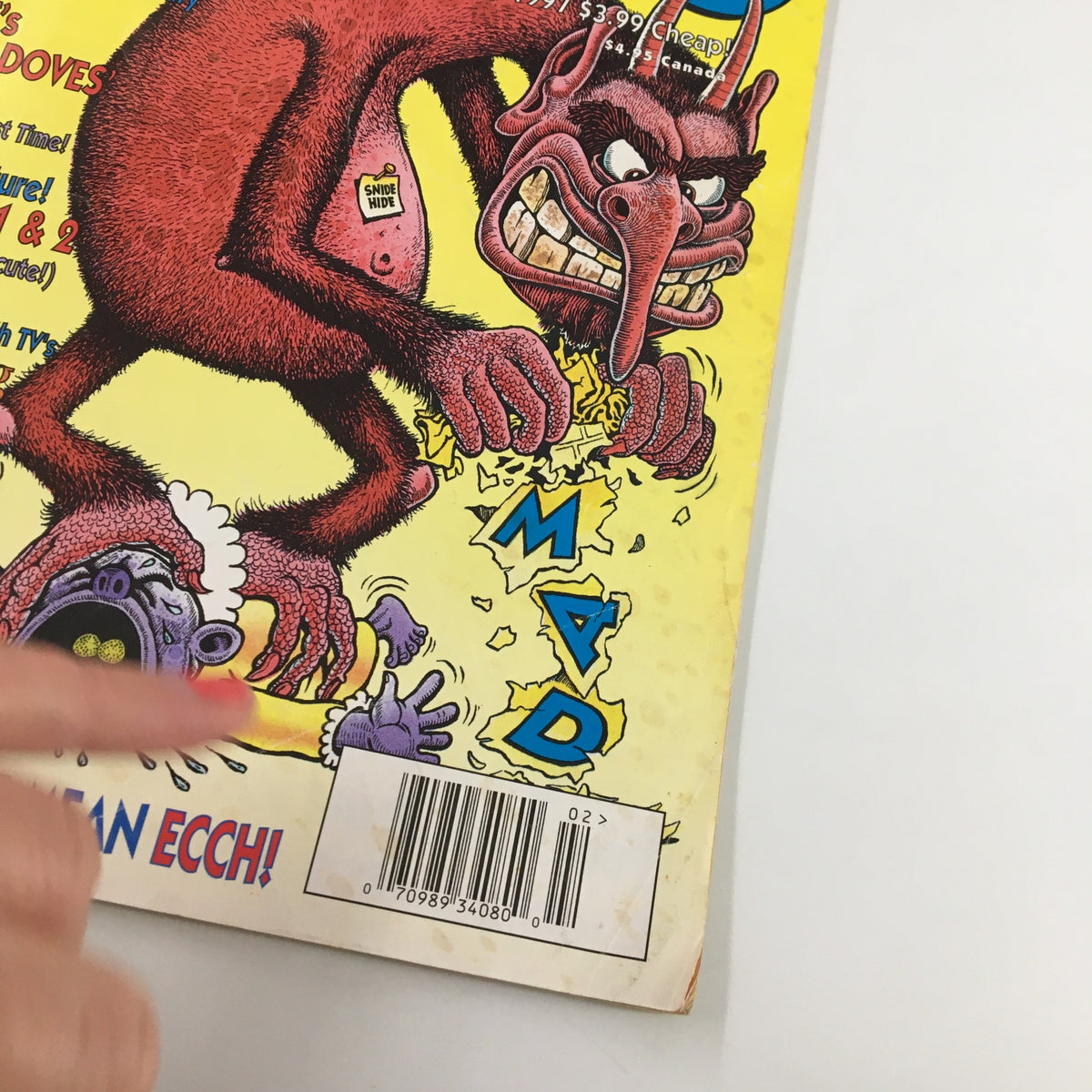 Detailed view of the cover of Mad Magazine February 1997 No. 118 focusing on Al Jaffee's 'Hawks and Doves', featuring a cartoonish monster design and the magazine's iconic logo.