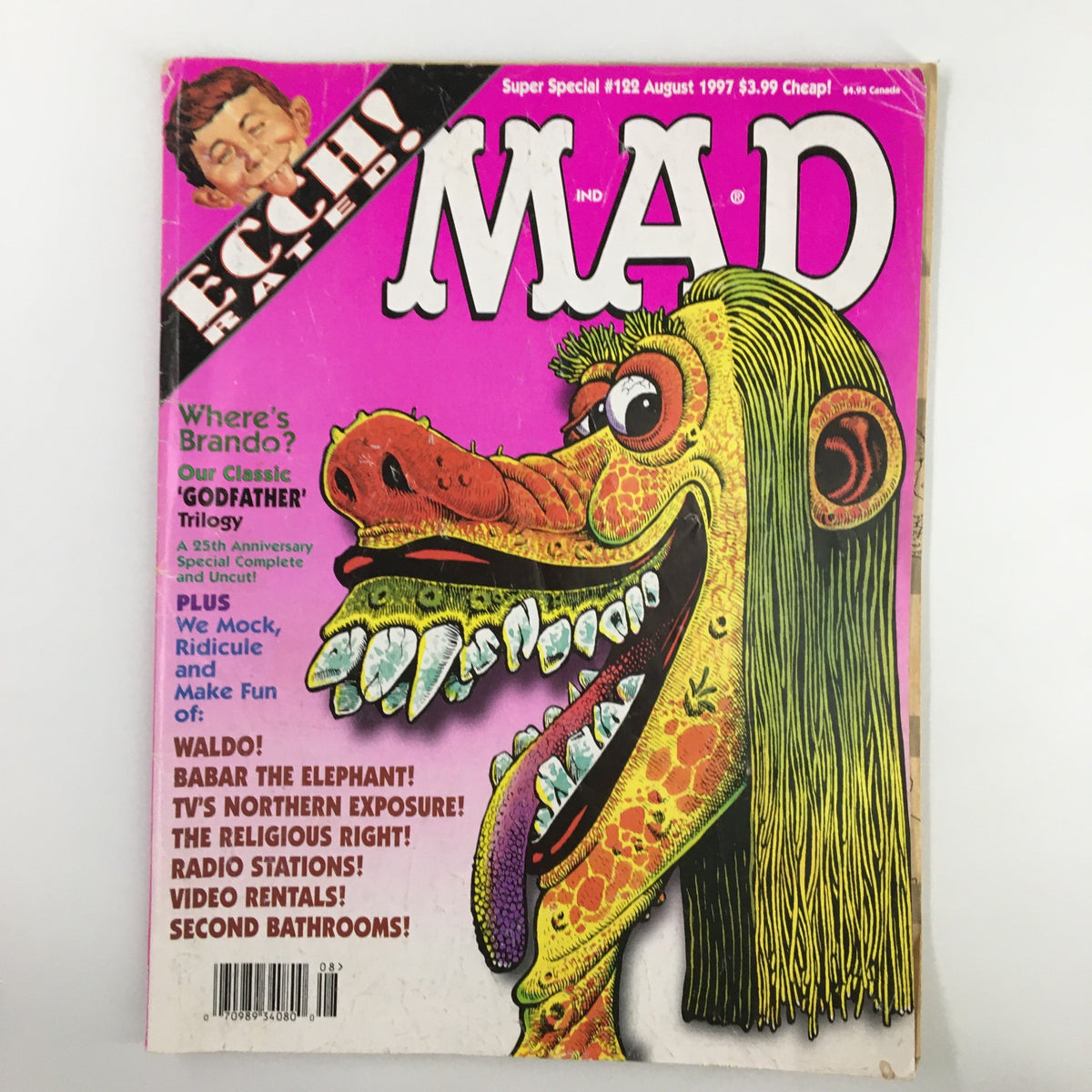Cover of Mad Magazine August 1997 #122 featuring a whimsical illustration of a creature with exaggerated features and humorous elements, highlighting the classic 'Godfather' trilogy.