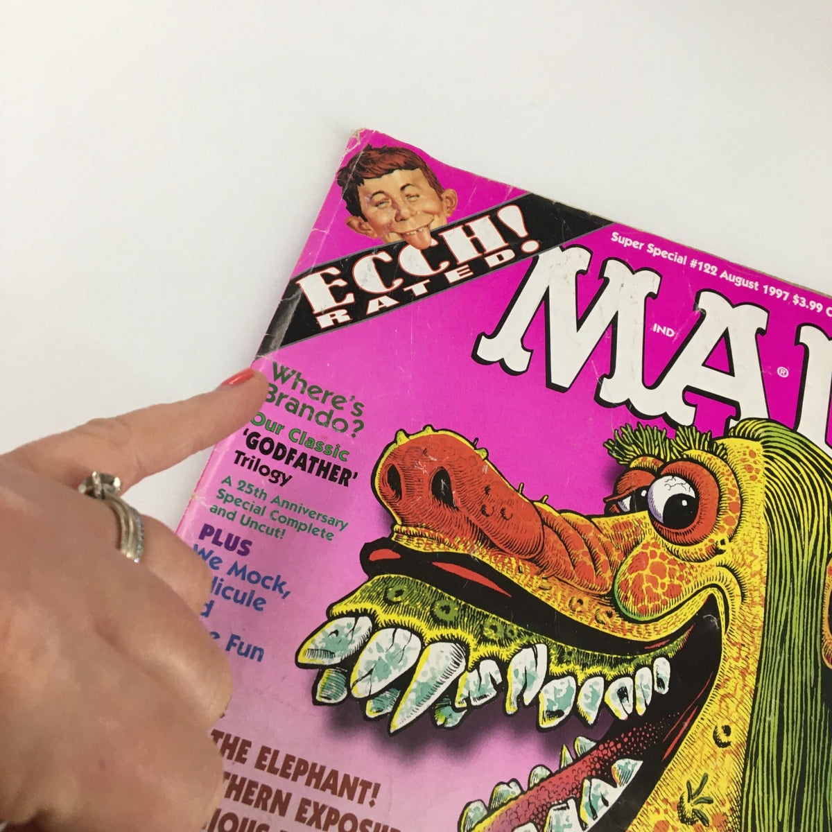 Close-up view of the Mad Magazine August 1997 #122 cover, showing the whimsical character design and the text 'Where's Brando? Our Classic 'Godfather' Trilogy'.
