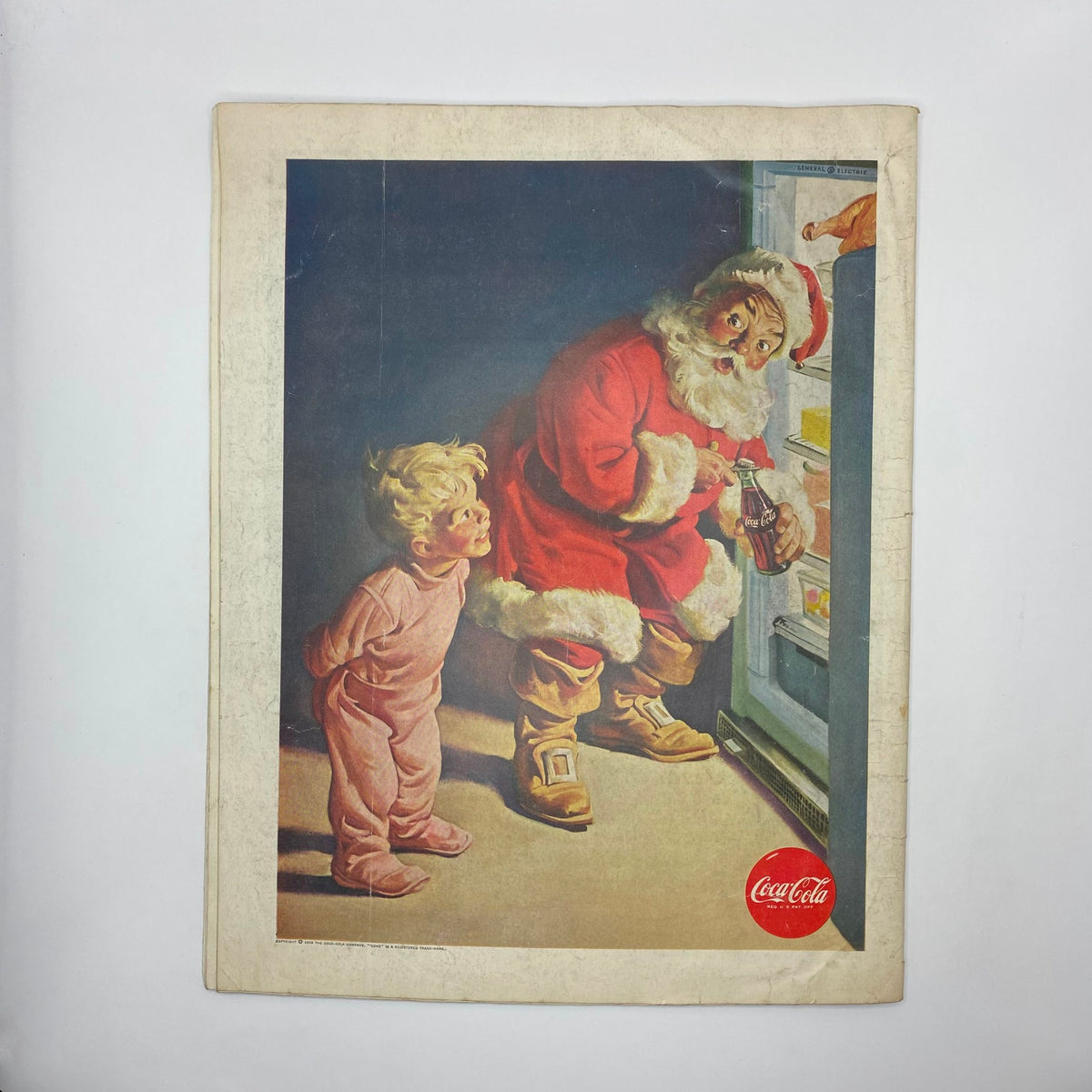 Back cover of Saturday Evening Post Magazine December 26, 1959 depicting Santa Claus and a child, promoting Coca-Cola.