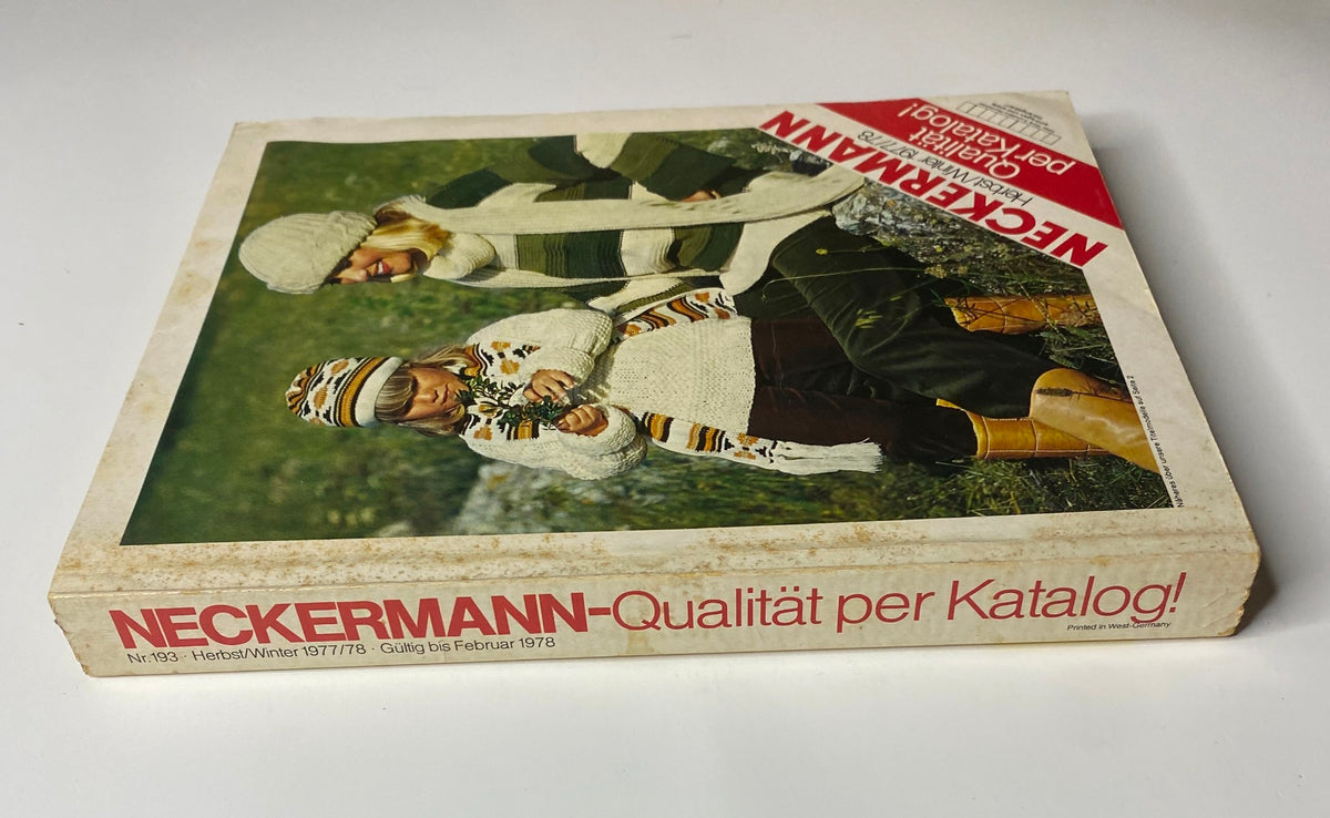 Side view of the 1977-1978 Neckermann Winter Catalog showing the spine and cover design with winter fashion imagery.