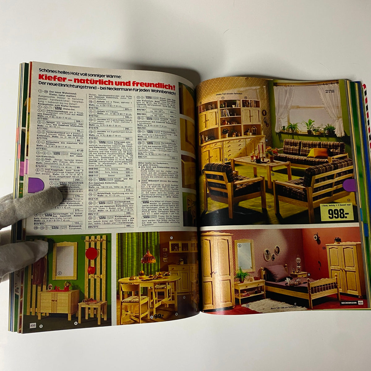 An open page from the 1976-1977 February Neckermann Winter Catalog showcasing wooden furniture and home goods from mid-1970s Germany.