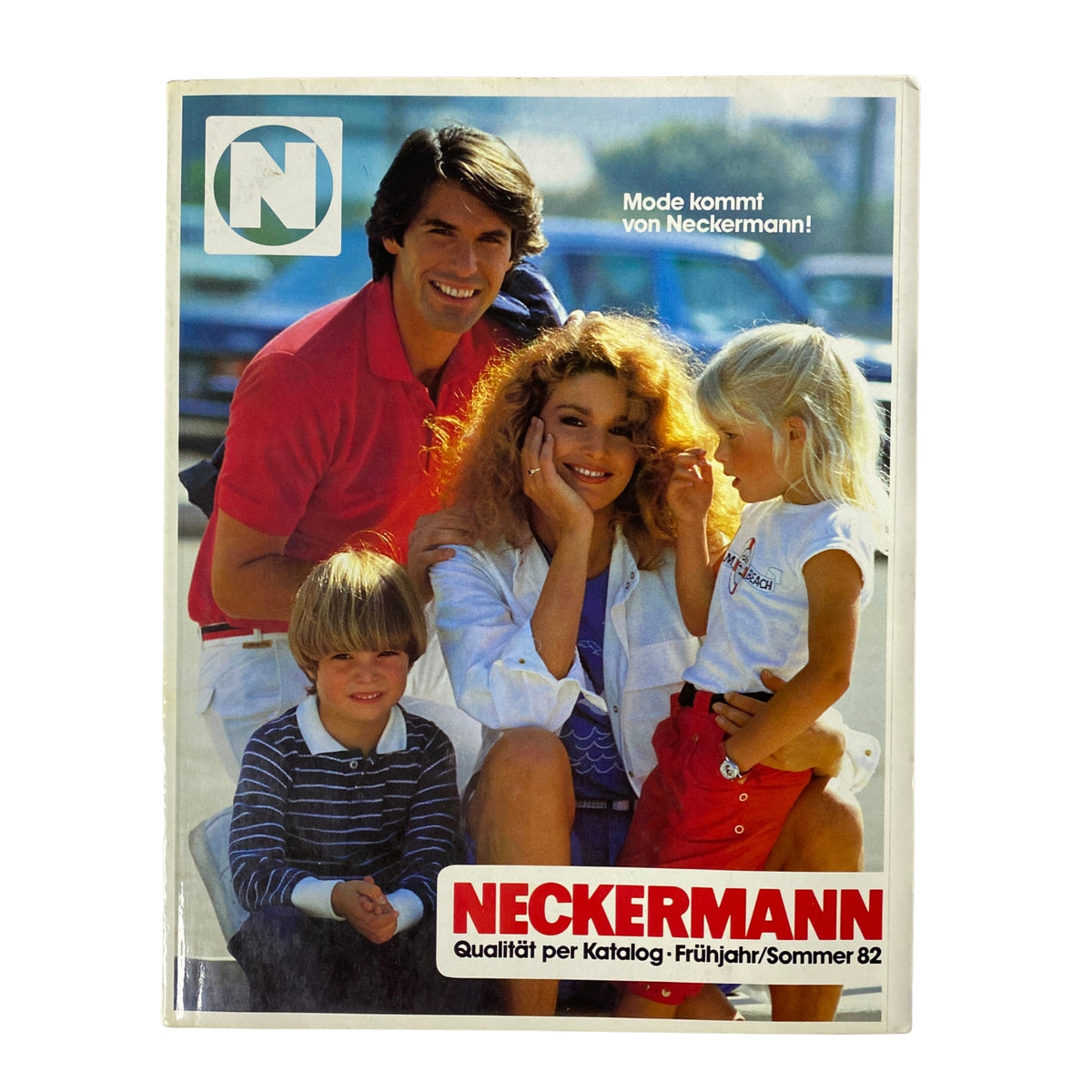 1982 Neckermann Summer Catalog cover featuring a cheerful family in summer attire, prominently displaying the Neckermann logo. Ideal for vintage catalog collectors and retro fashion enthusiasts.