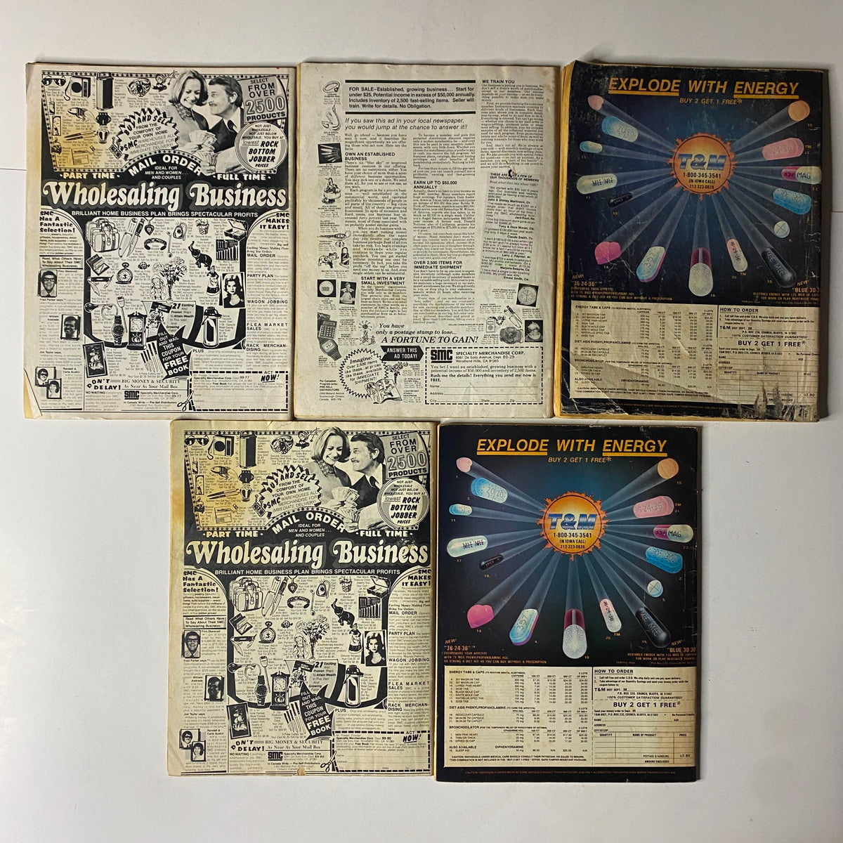 Lot of 5 1970s-1980s Police Detective, True Detective's Crime Yearbook showcasing the back cover and interior pages of vintage magazines with advertisements and content related to the home business plan and energy products.