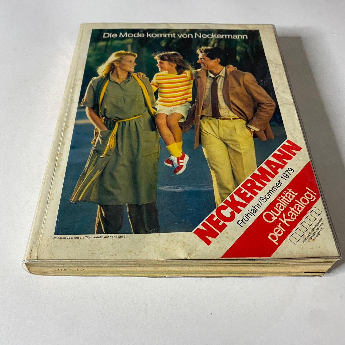 Front cover of the 1979 Neckermann Sommer Catalog displaying three models in fashionable outfits, highlighting European fashion trends of the late 1970s with a vibrant color scheme.