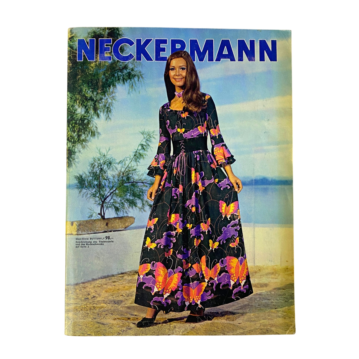 Cover of the 1971 Neckermann Sommer Catalog featuring a model in a vibrant butterfly-patterned dress, showcasing the fashion styles of the early 1970s.