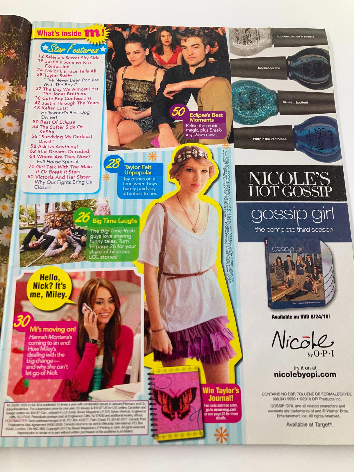Inside spread of M Magazine August 2010 featuring various articles and images related to pop culture and teen idols, including Selena Gomez, Justin Bieber, and Taylor Lautner. The magazine includes a section titled 'What's Inside' highlighting content from the issue.