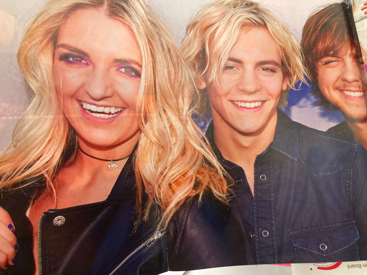 A vibrant photo from Tiger Beat Magazine October 2015 of stars smiling, enhancing the youthful essence of pop culture.