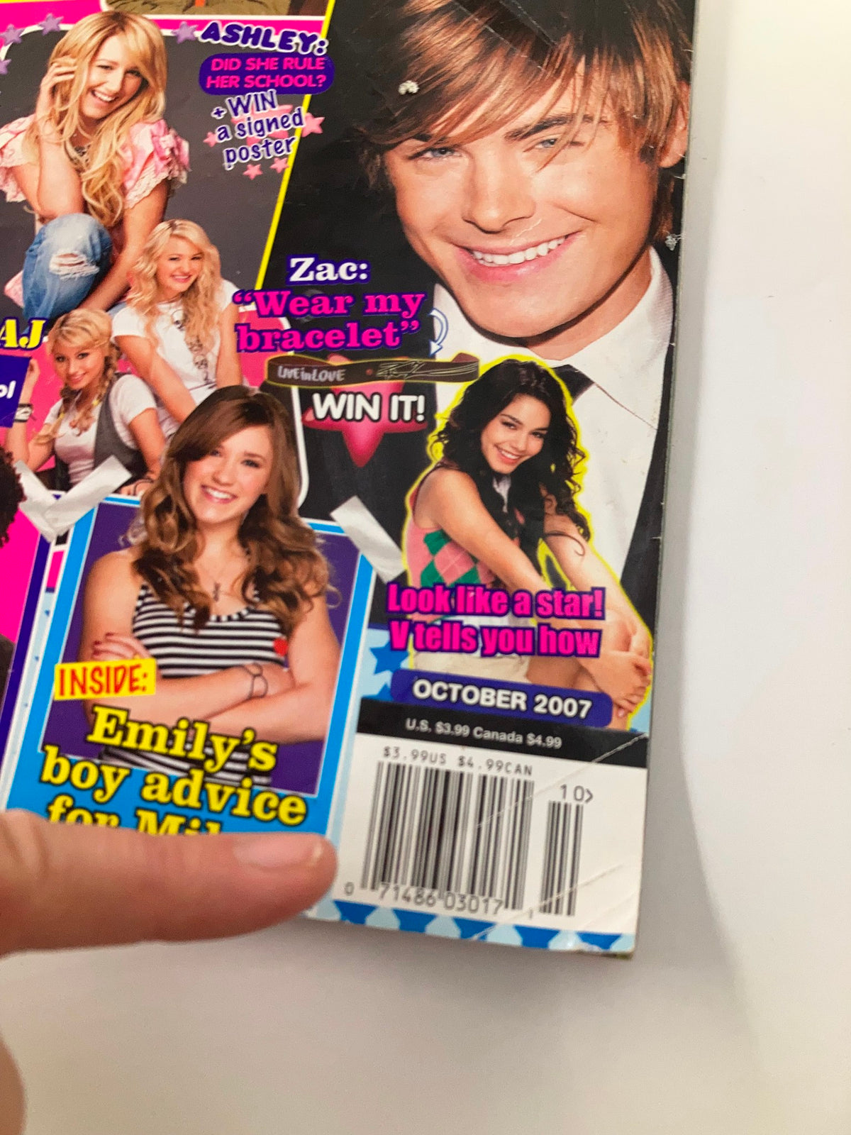 Close-up of Tiger Beat Magazine October 2007 showing Zac Efron's image and promotional text for a signed bracelet giveaway.