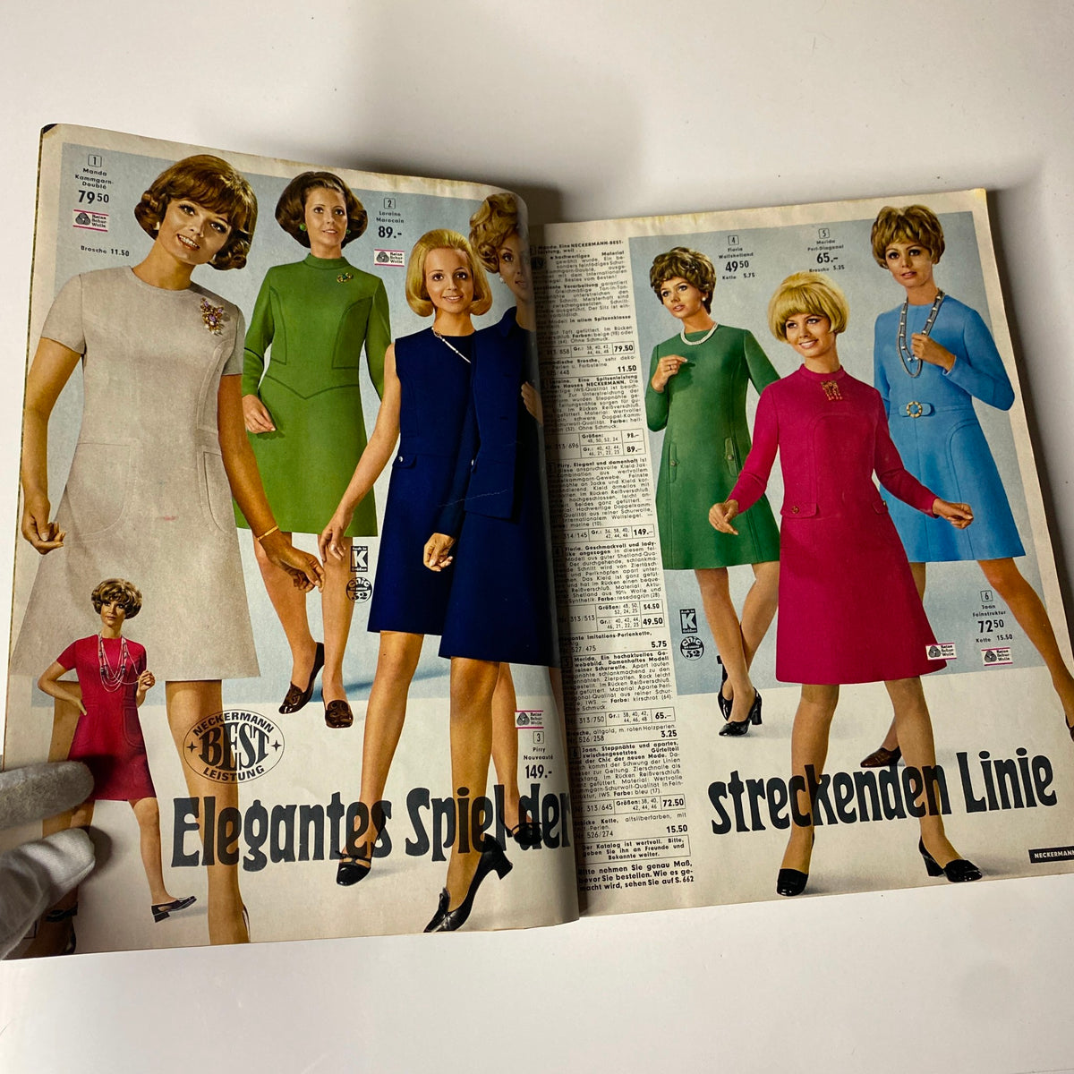 A sophisticated page from the 1973 Neckermann Summer Catalog presenting elegant dress designs, showcasing models in various colors and styles ideal for retro fashion collectors.