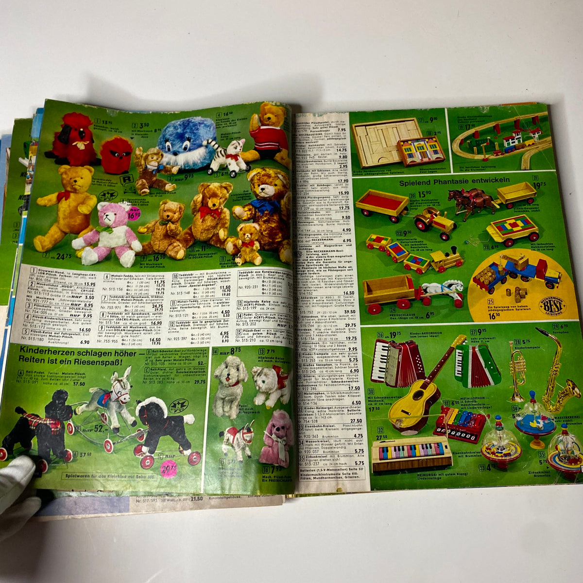 Charming page from the 1973 Neckermann Summer Catalog displaying an assortment of stuffed animals and children's musical toys.