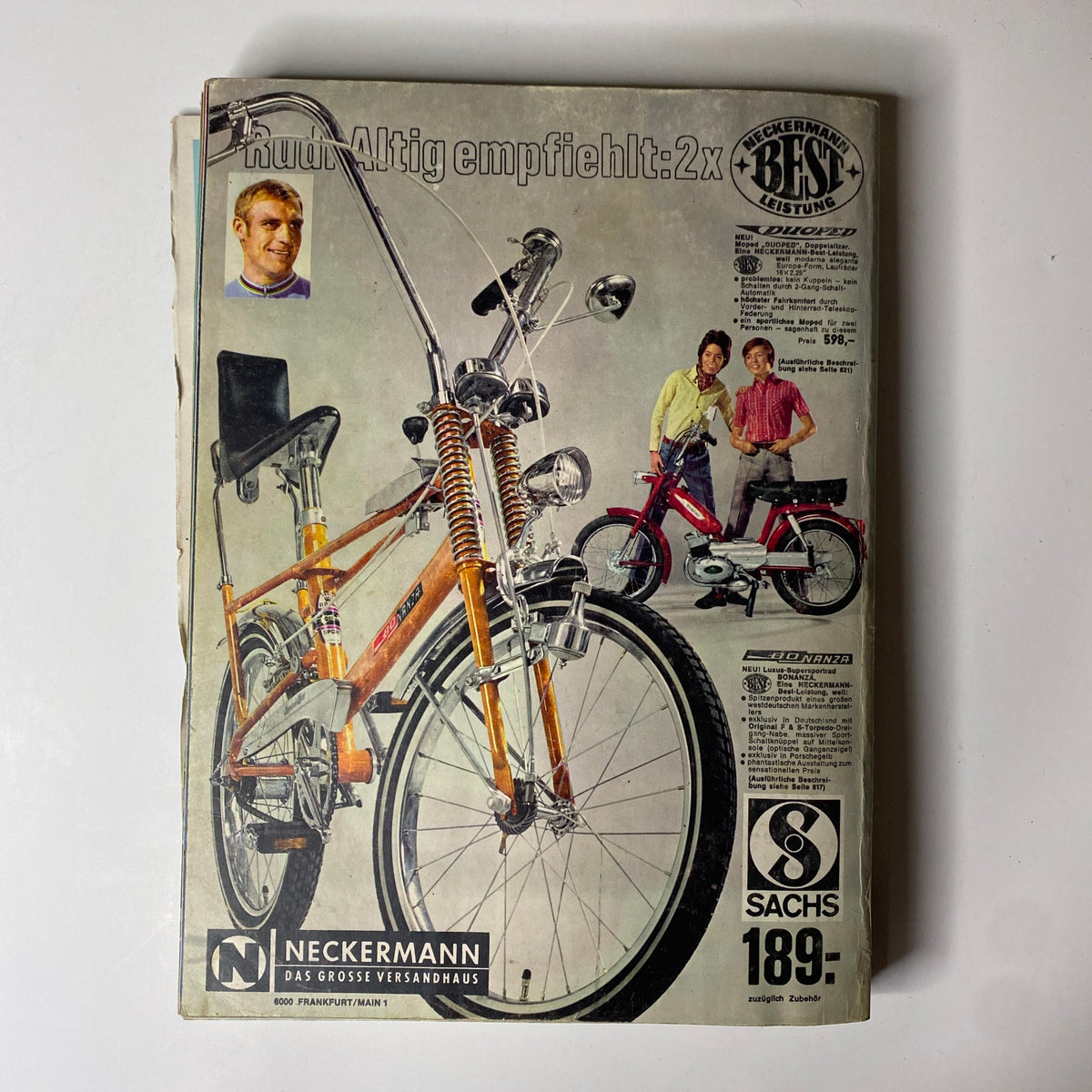 Cover of the 1970 Neckermann Summer Catalog featuring a stylish children's bicycle and a small moped with models posing next to them.