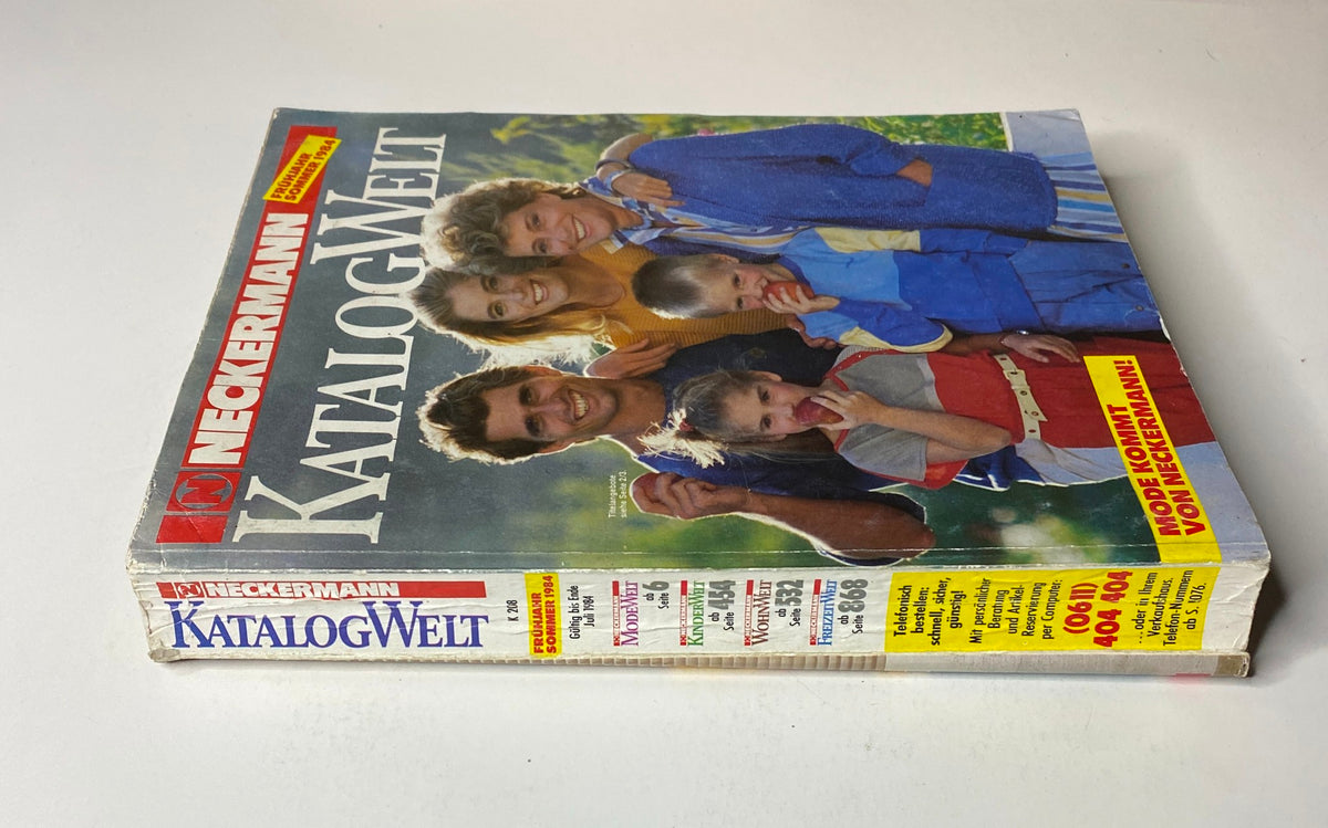 Cover image of the 1984 Neckermann Summer Catalog featuring a smiling family, showcasing mid-1980s fashion and lifestyle.