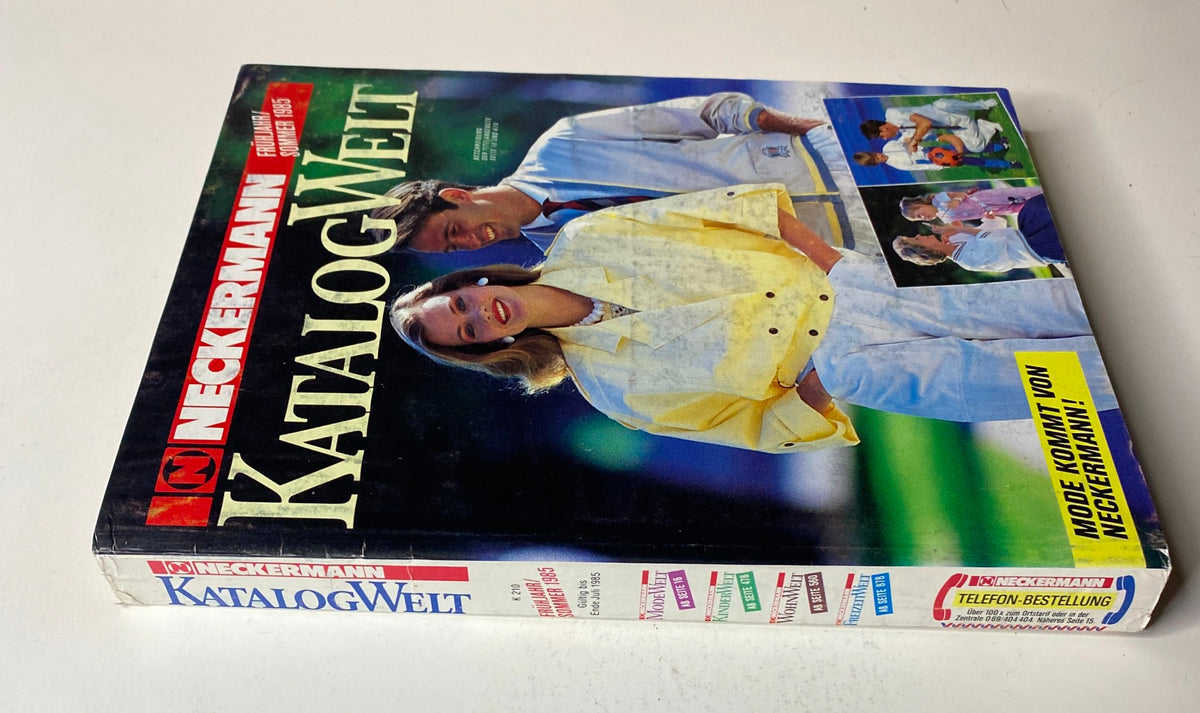 1985 Neckermann Summer Catalog showcasing the vibrantly designed cover featuring a couple in stylish summer attire.
