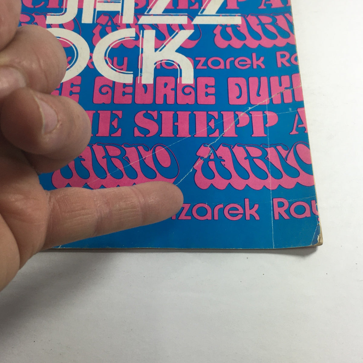 Close-up of the Down Beat Magazine cover from November 7, 1974, showcasing the prominent names Ray Manzarek, George Duke, and Archie Shepp with bold text on a vibrant background.