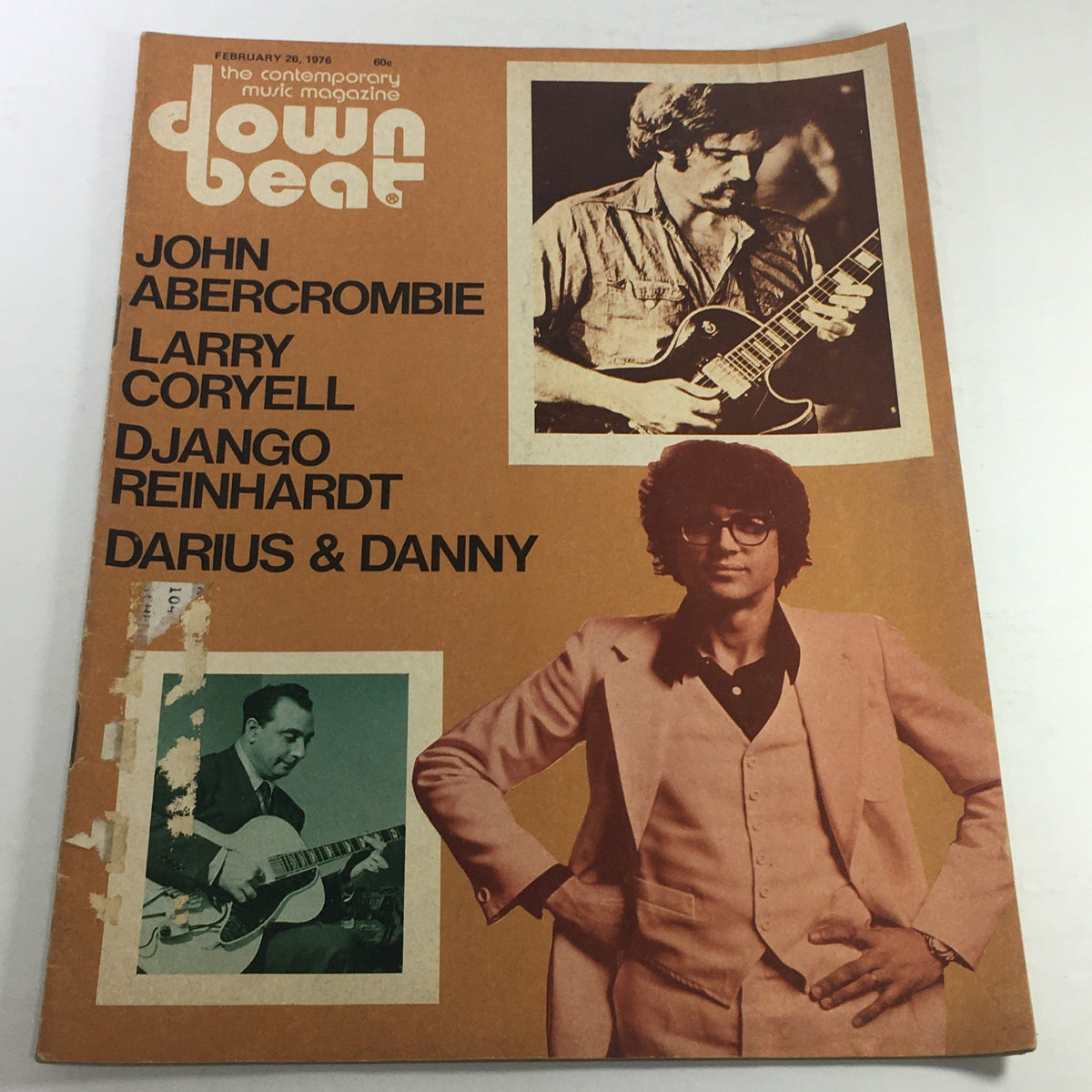 Vintage Down Beat Magazine cover from February 26, 1976, featuring John Abercrombie, Larry Coryell, Django Reinhardt, and Darius & Danny. An essential collectible for music enthusiasts showcasing iconic jazz musicians of the era.