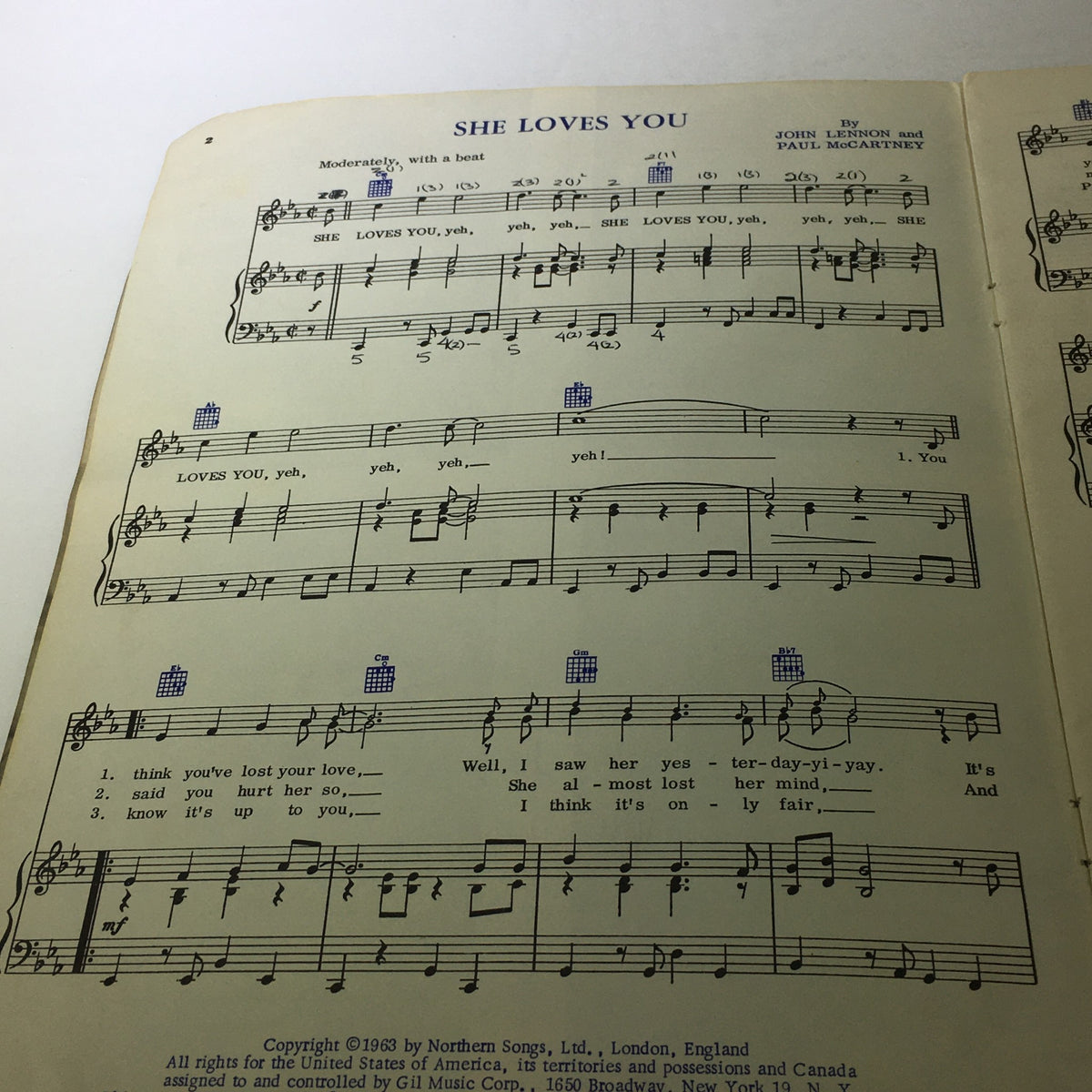 Sheet music for 'She Loves You' from VTG The Beatle Book Souvenir Song Album, 1963 featuring Paul McCartney and John Lennon.
