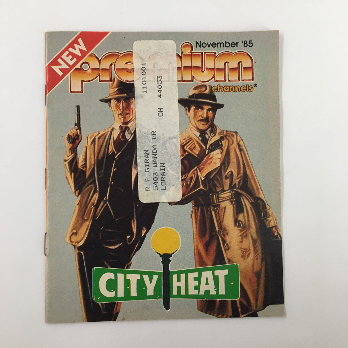Cover of VTG Premium Channels Mini Magazine from November 1985 featuring iconic movie characters from 'City Heat' with a vintage aesthetic.