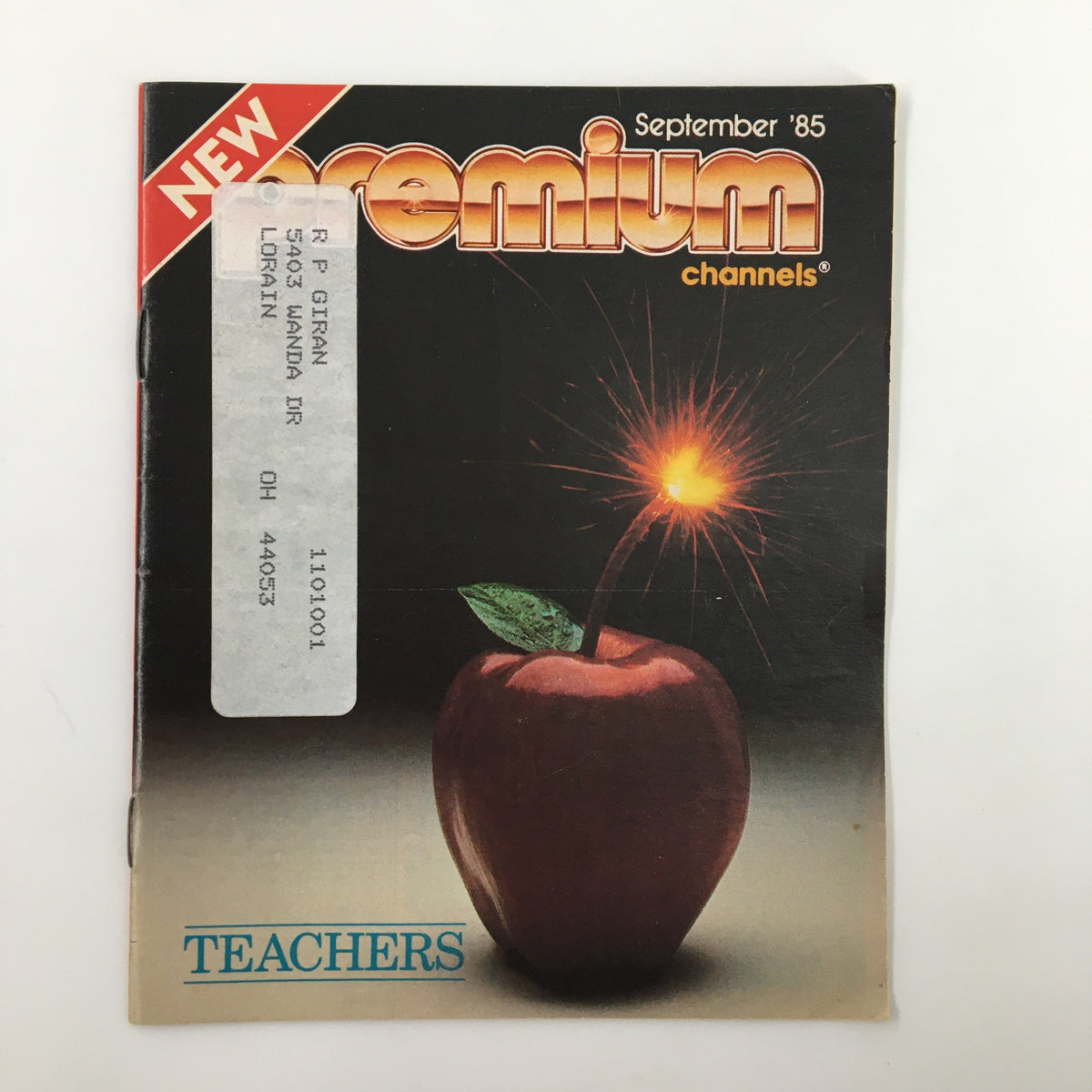 Cover of VTG Premium Channels Mini Magazine from September 1985 featuring an artistic apple with a spark, highlighting Nick Nolte in the movie Teachers.