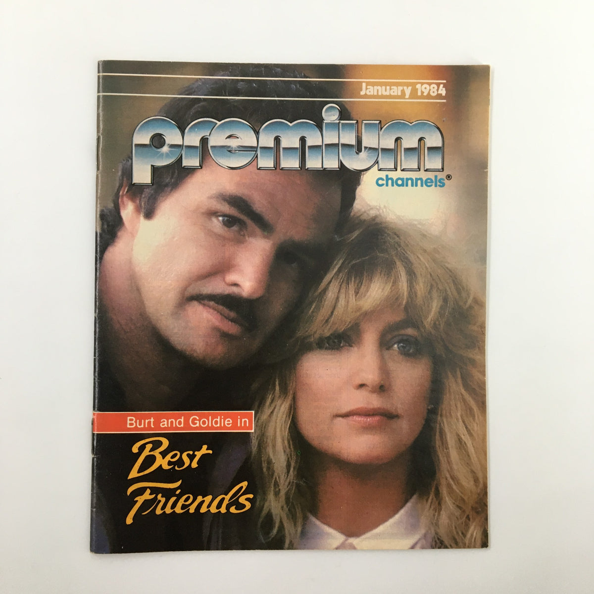 Cover of the January 1984 VTG Premium Channels Mini Magazine featuring Burt Reynolds and Goldie Hawn, highlighting their role in the film 'Best Friends.'