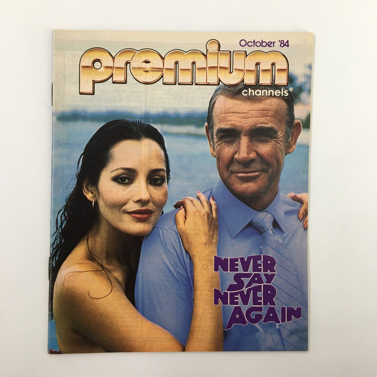 Cover of VTG Premium Channels Mini Magazine from October 1984 featuring Sean Connery and Kim Basinger, highlighting the film 'Never Say Never Again'.