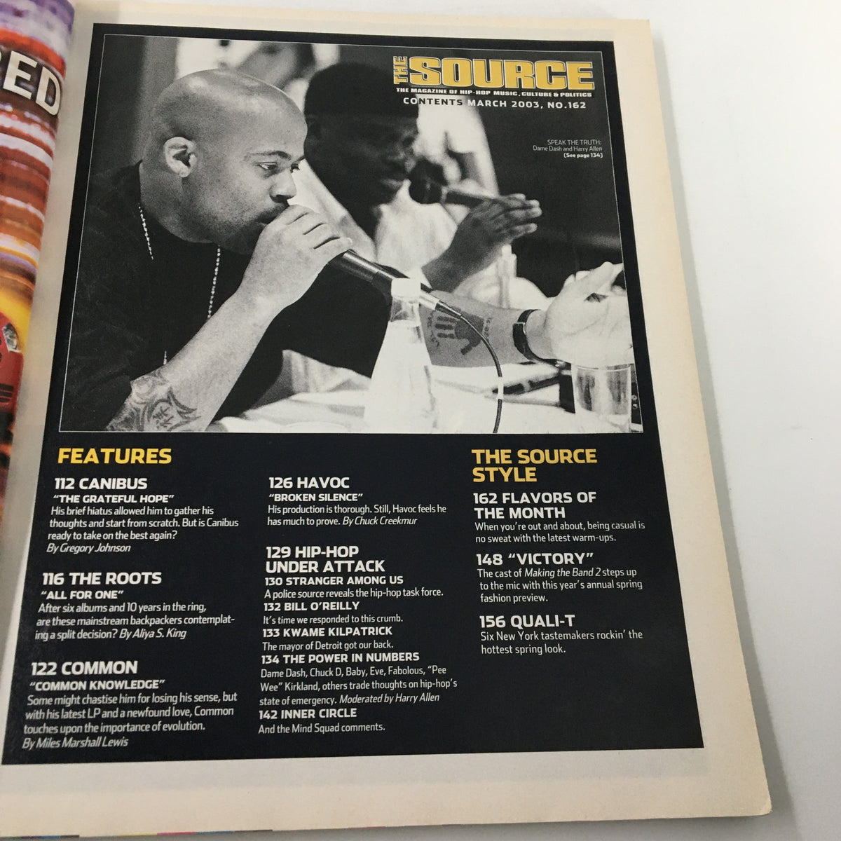 Inside page of The Source Magazine, March 2003, No. 162, featuring hip-hop artists Canibus and Havoc during an event, showcasing the magazine's focus on influential figures in early 2000s music.