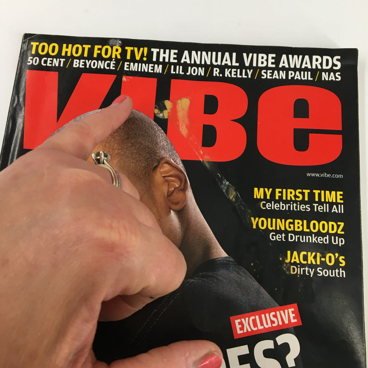 Close-up of the VIBE Magazine January 2004 cover showing the headline 'TOO HOT FOR TV! THE ANNUAL VIBE AWARDS' alongside Jay-Z's image.