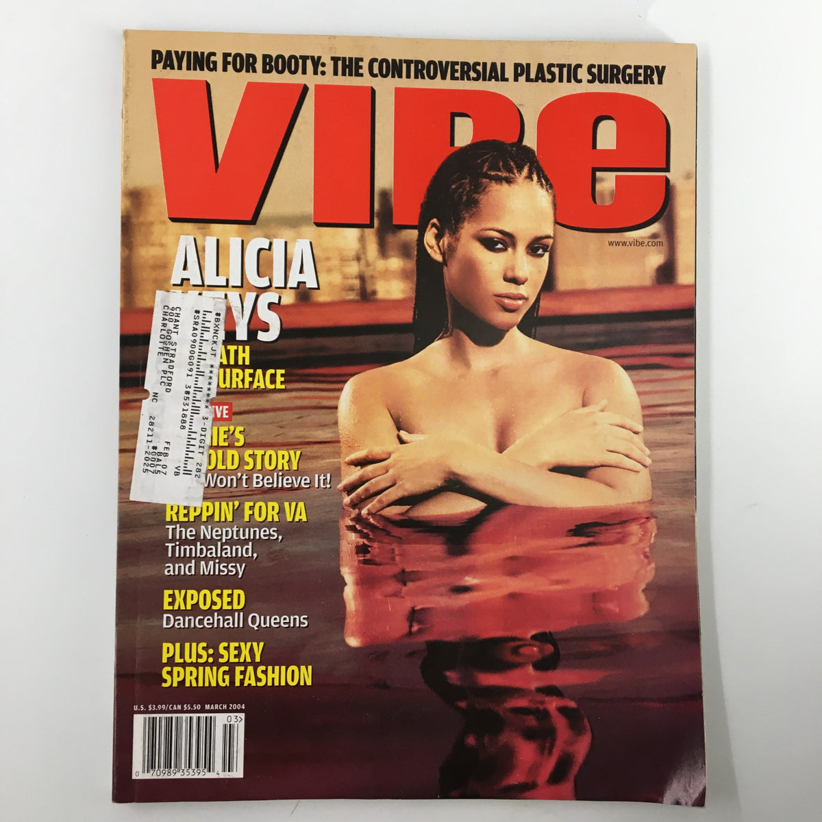 VIBE Magazine March 2004 cover featuring Alicia Keys, showcasing her artistic vision while submerged in water, with text highlighting features about The Neptunes, Timbaland, Missy Elliott, and plastic surgery controversy.